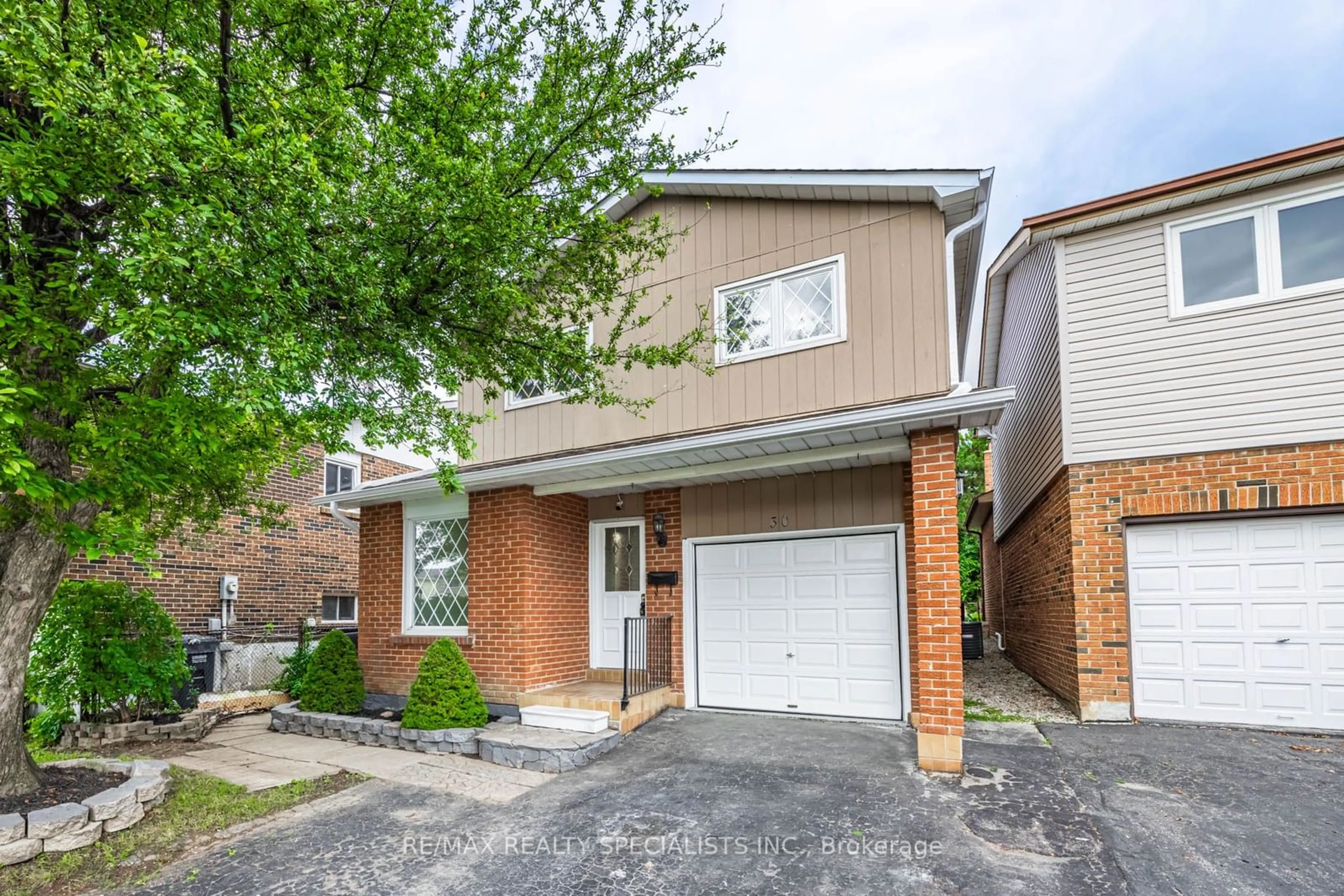 Home with brick exterior material, street for 30 Winterfold Dr, Brampton Ontario L6V 3T2