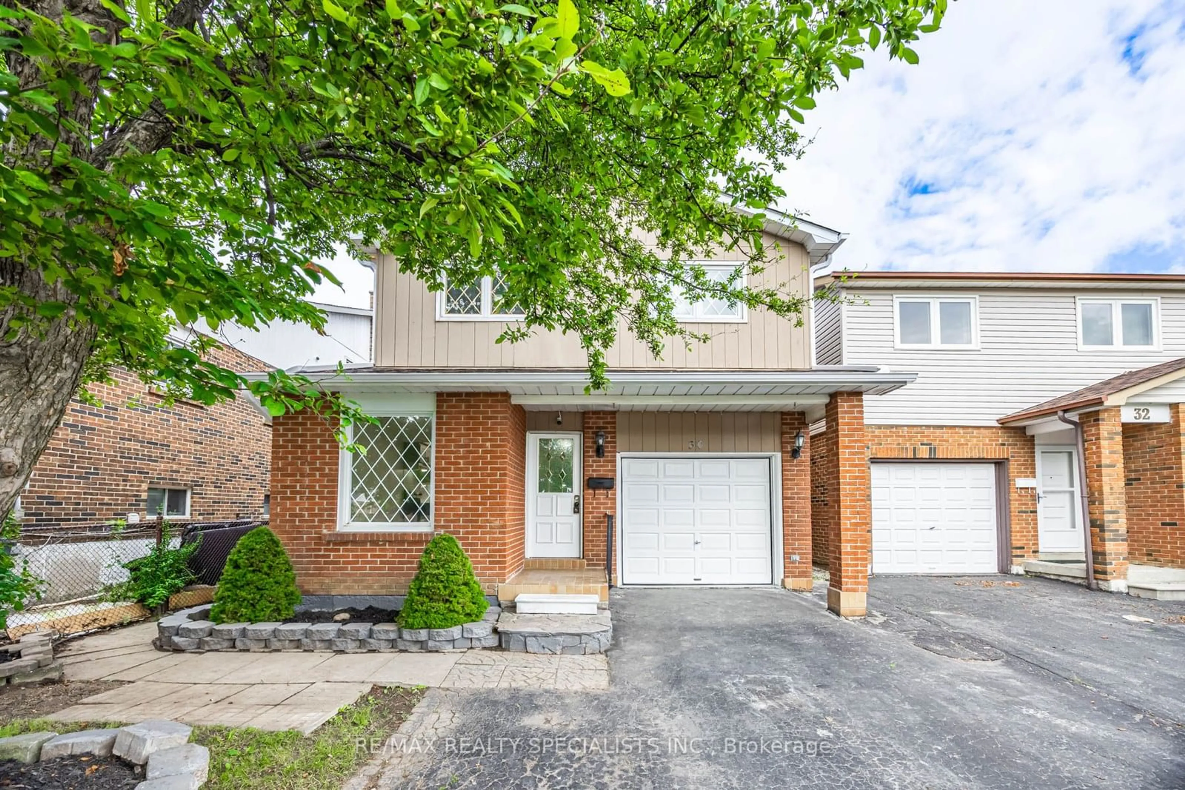 Home with brick exterior material, street for 30 Winterfold Dr, Brampton Ontario L6V 3T2