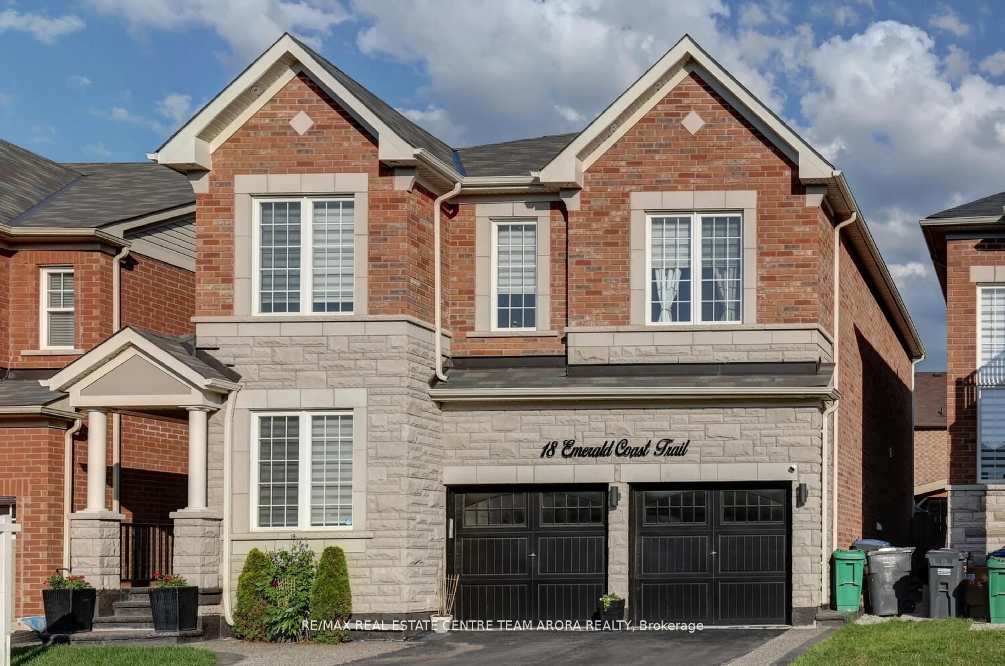 Home with brick exterior material, street for 18 Emerald Coast Tr, Brampton Ontario L7A 5A7