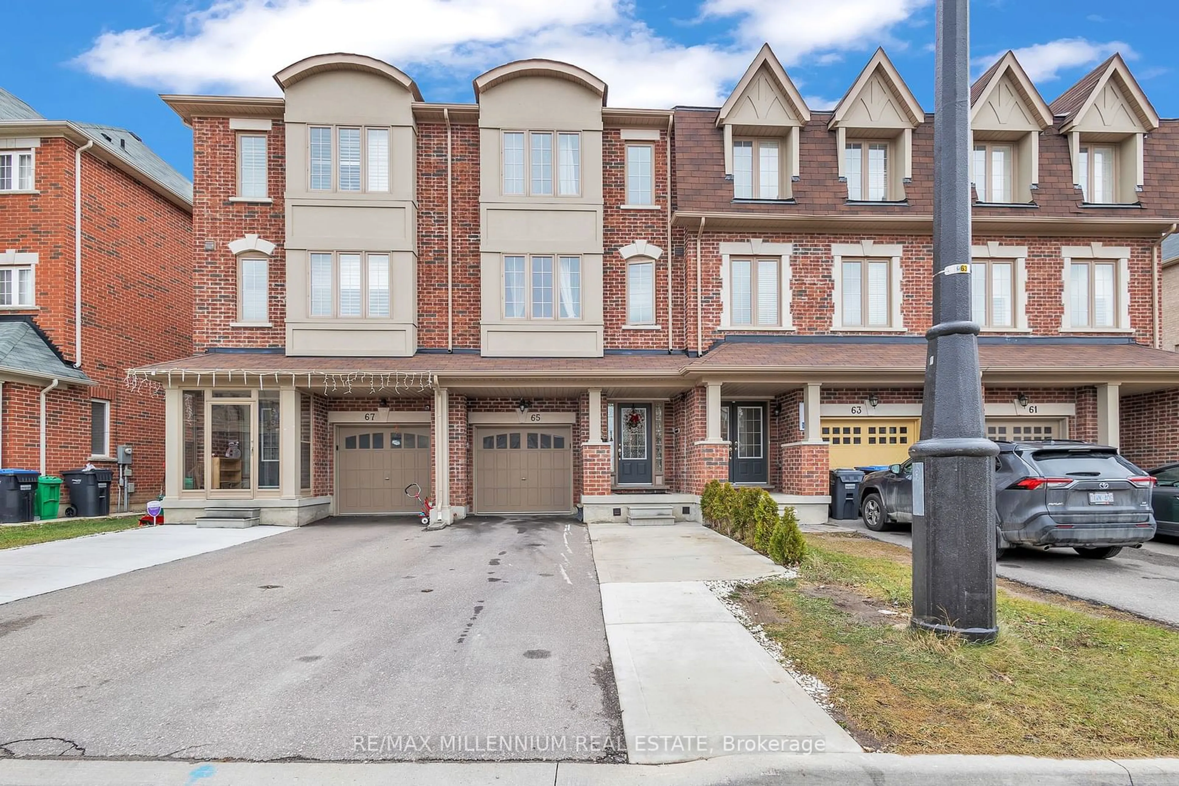 Home with brick exterior material, street for 65 New Pines Tr, Brampton Ontario L6Z 0H6