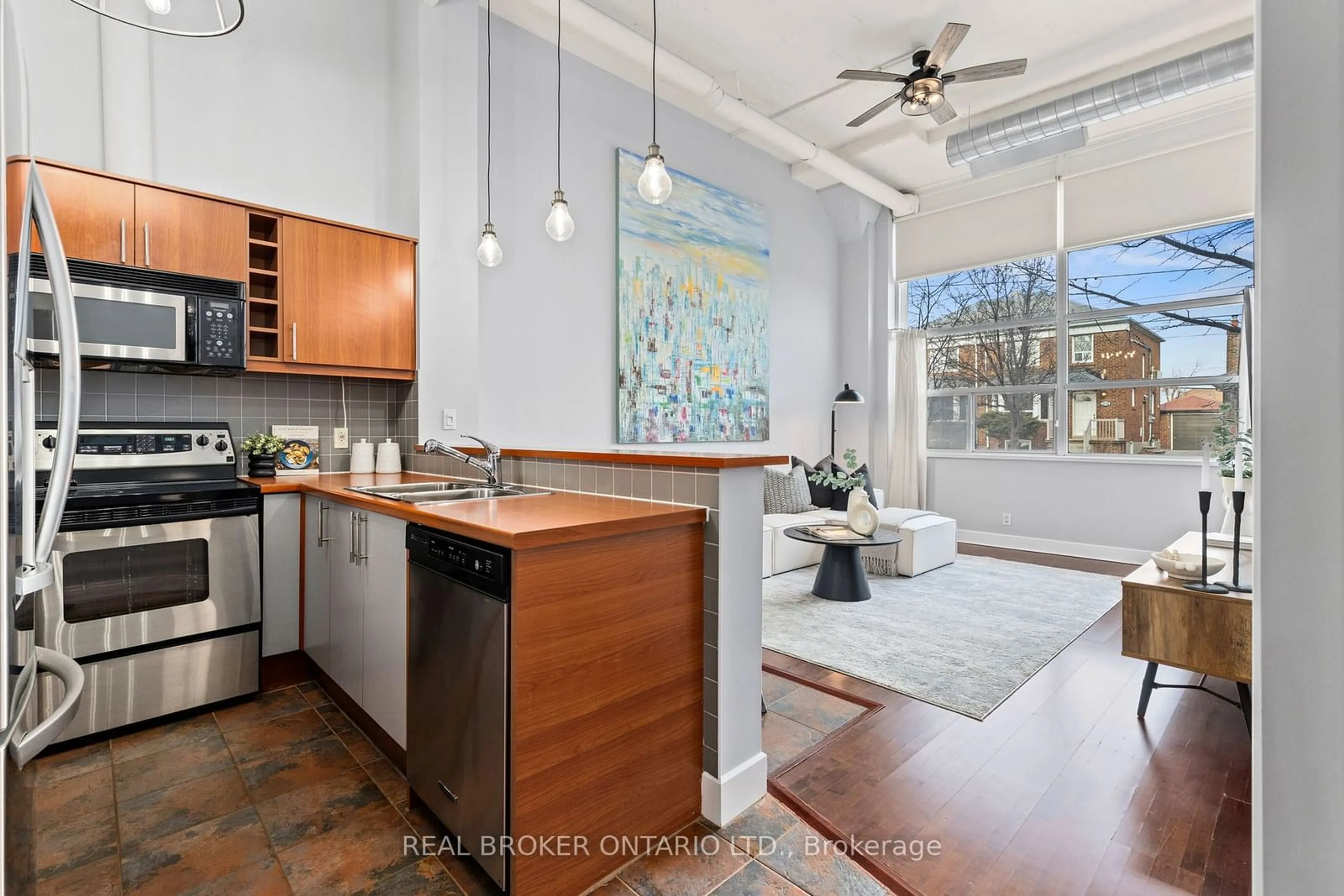 Open concept kitchen, ceramic/tile floor for 1001 Roselawn Ave #112, Toronto Ontario M6B 4M4