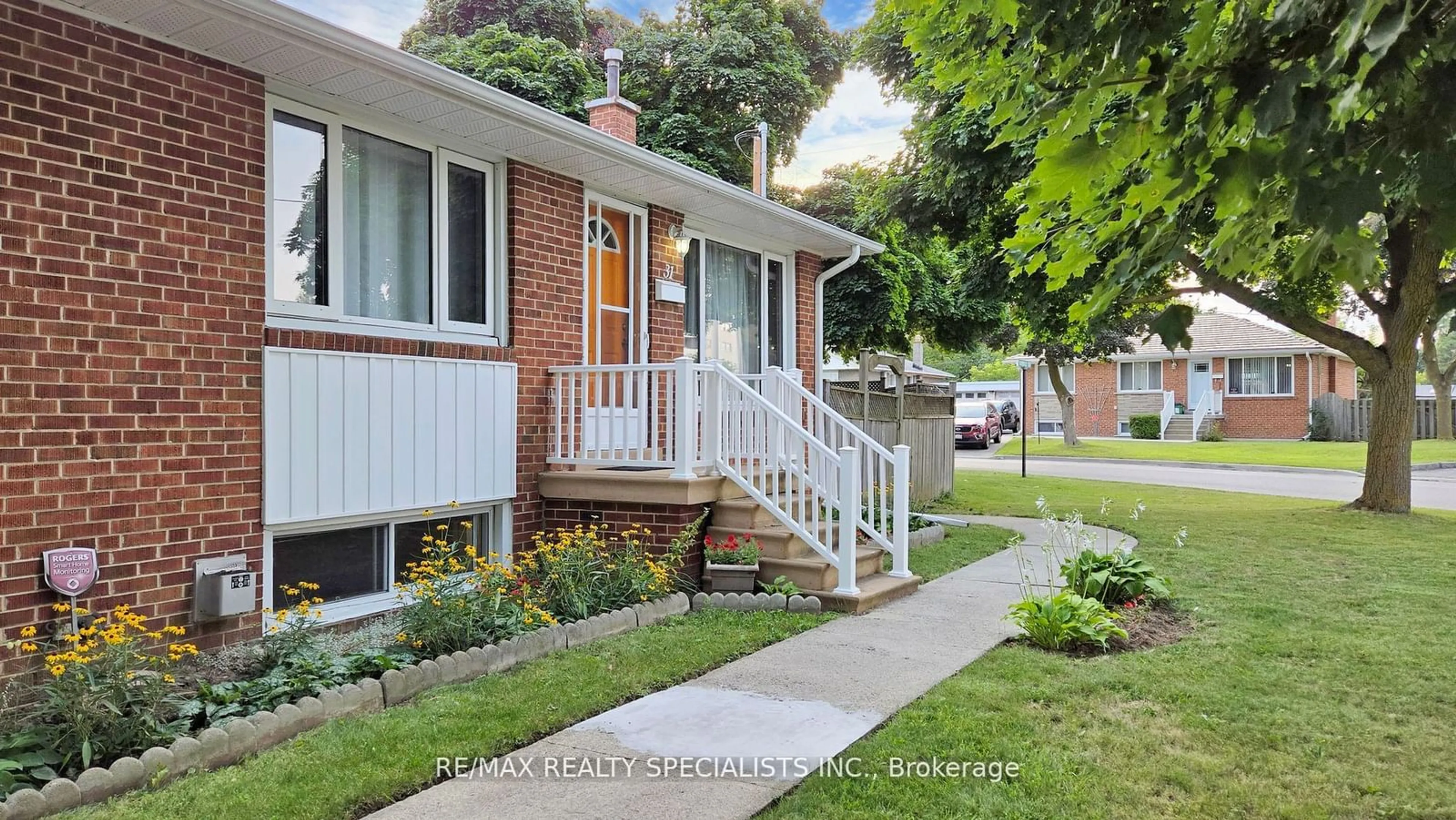 Home with vinyl exterior material, street for 31 Brisco St, Brampton Ontario L6V 1X1