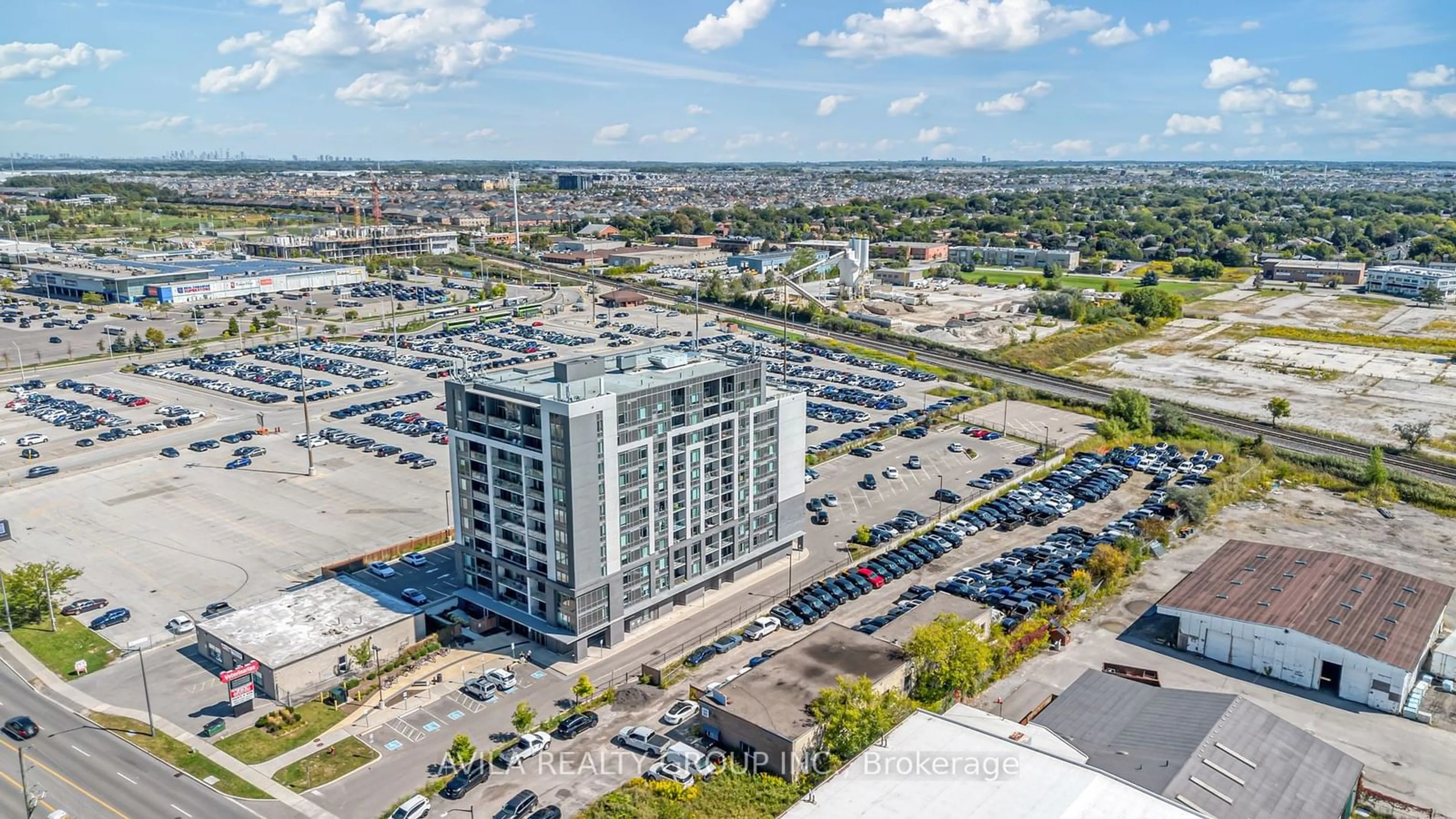 A pic from outside/outdoor area/front of a property/back of a property/a pic from drone, unknown for 716 Main St #102, Milton Ontario L9T 3P6