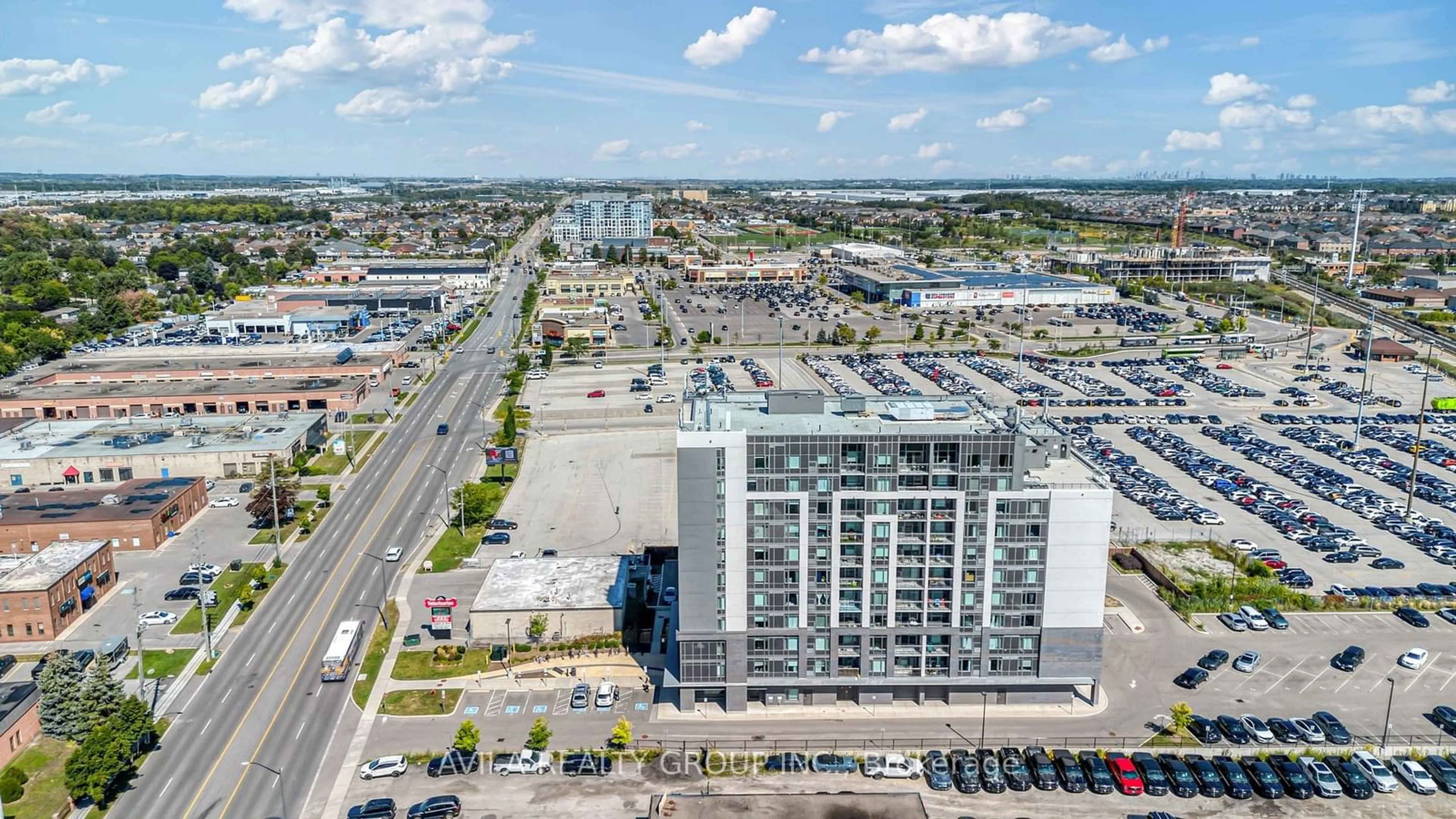 A pic from outside/outdoor area/front of a property/back of a property/a pic from drone, city buildings view from balcony for 716 Main St #102, Milton Ontario L9T 3P6