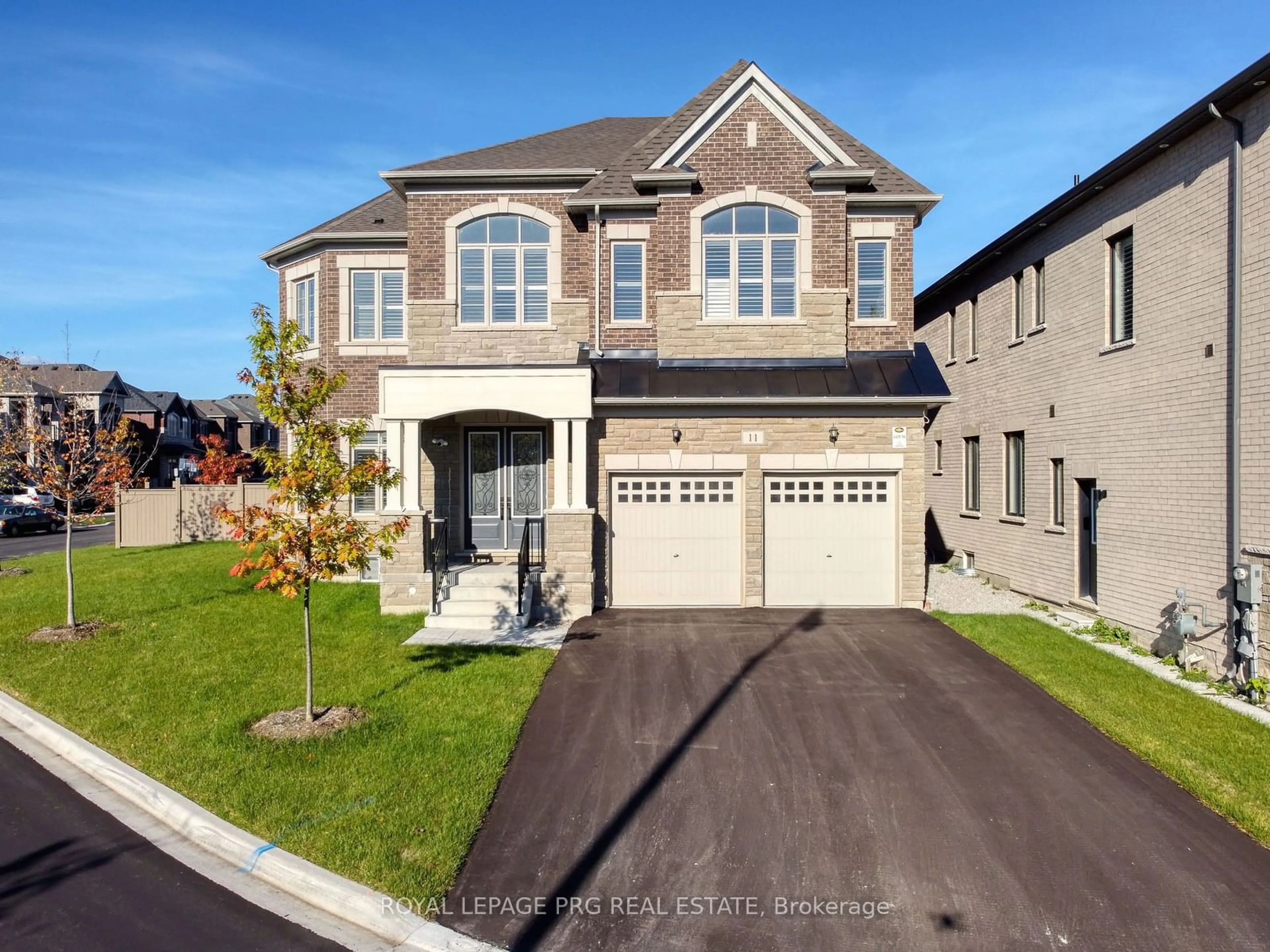 Home with brick exterior material, street for 11 Jura Cres, Brampton Ontario L6P 4R3