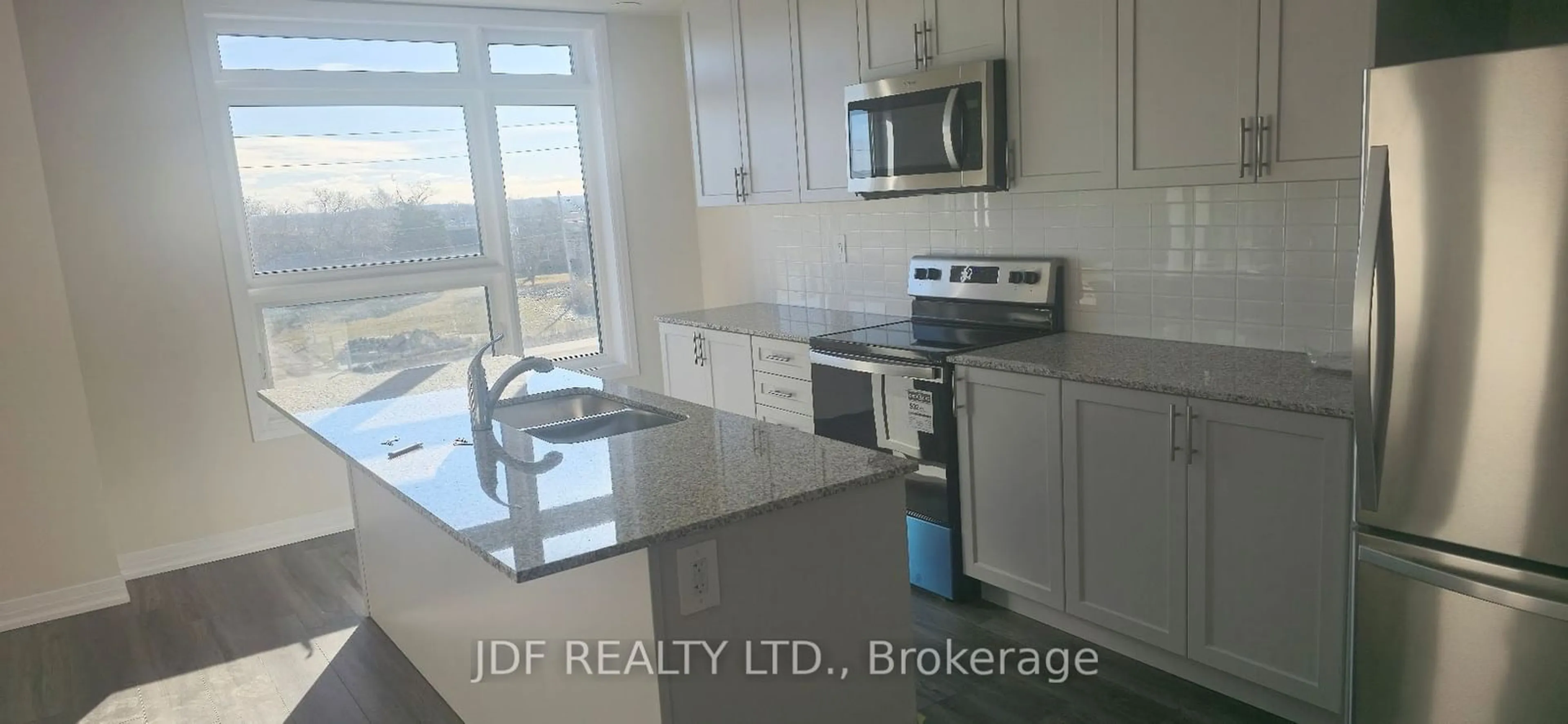 Open concept kitchen, unknown for 1581 Rose Way #510, Milton Ontario L9T 7E7