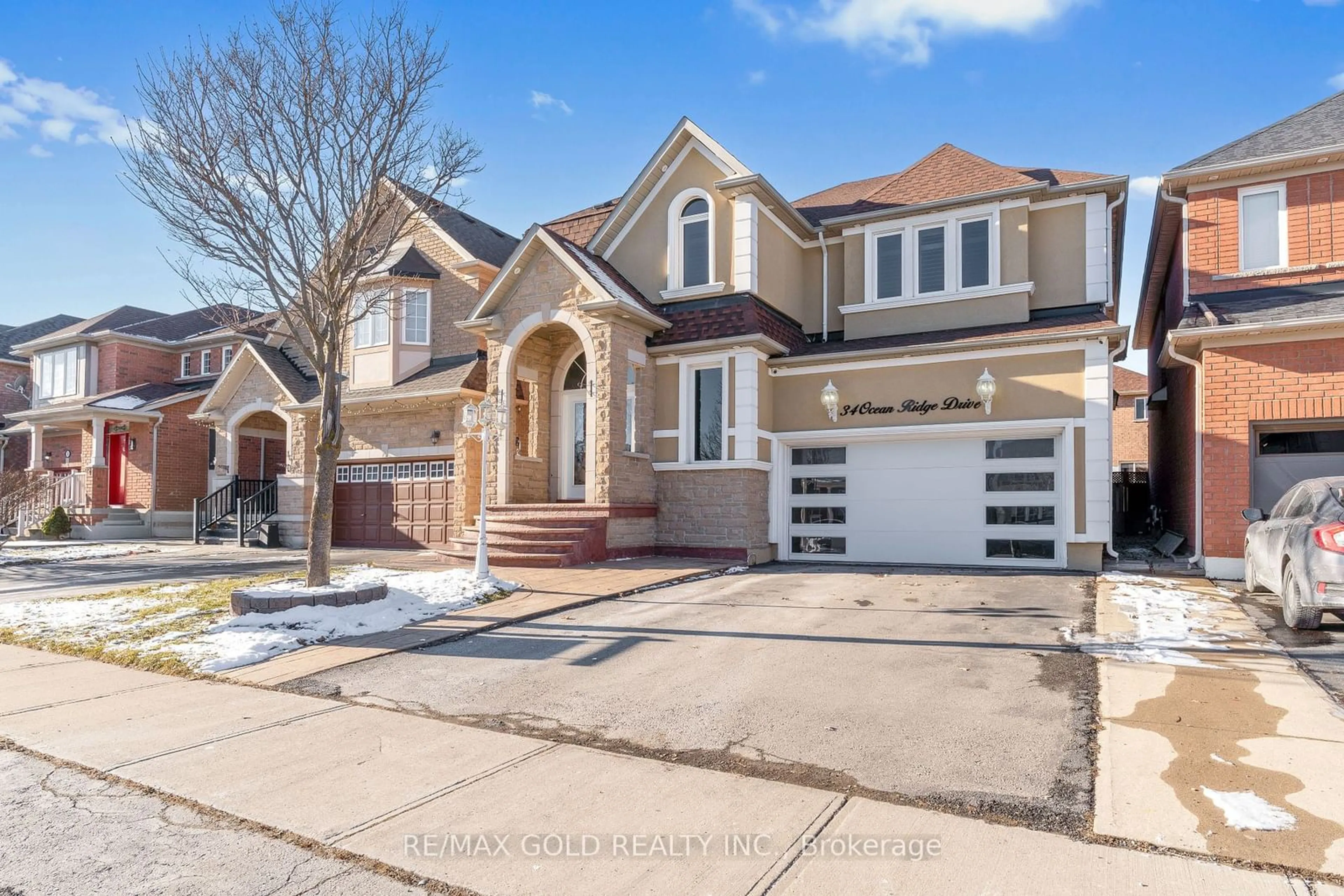 Home with brick exterior material, street for 34 Ocean Ridge Dr, Brampton Ontario L6R 3K5