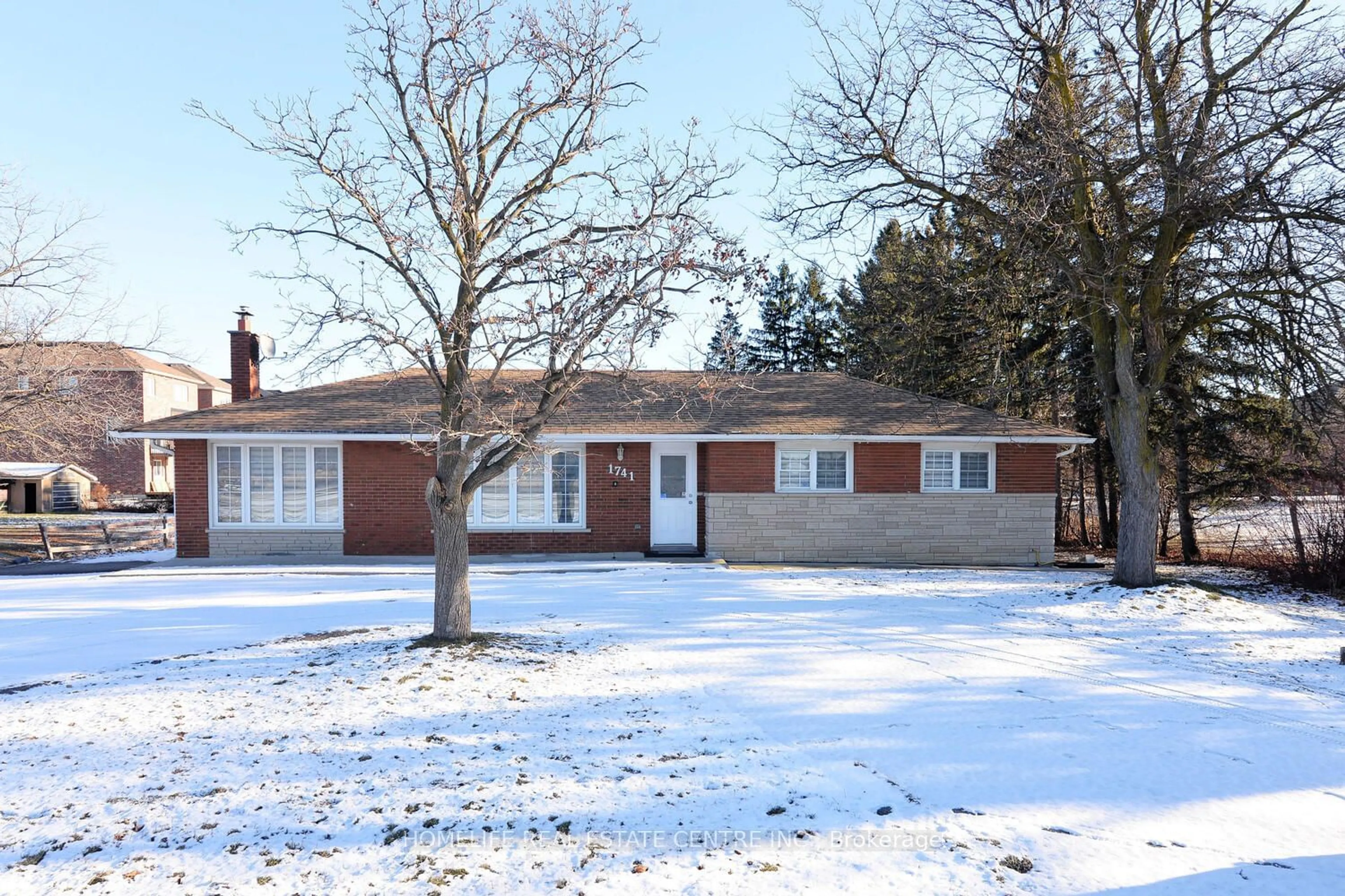 Home with brick exterior material, street for 1741 Countryside Dr, Brampton Ontario L6R 0B7