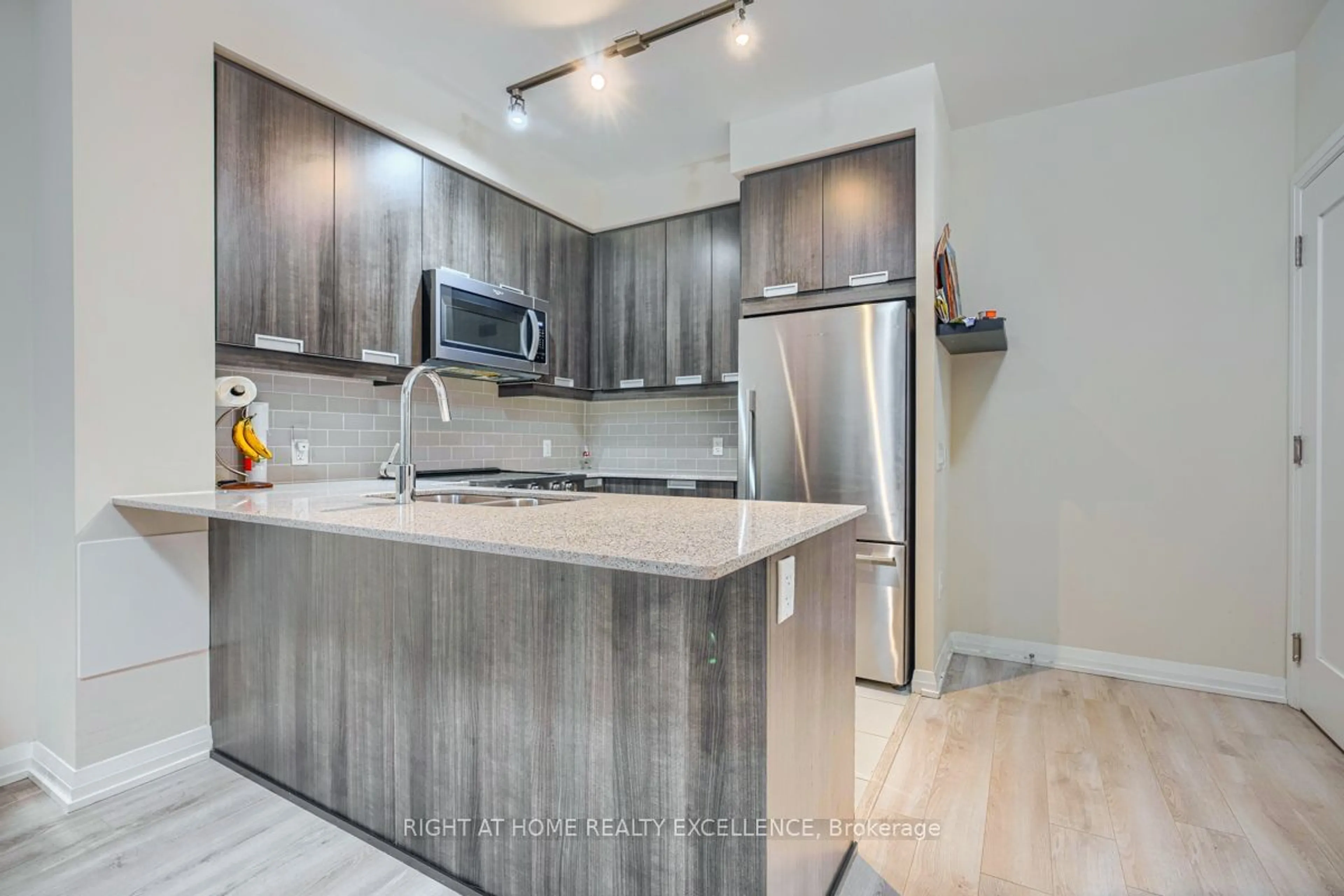 Open concept kitchen, unknown for 65 Watergarden Dr #201, Mississauga Ontario L5R 0G9