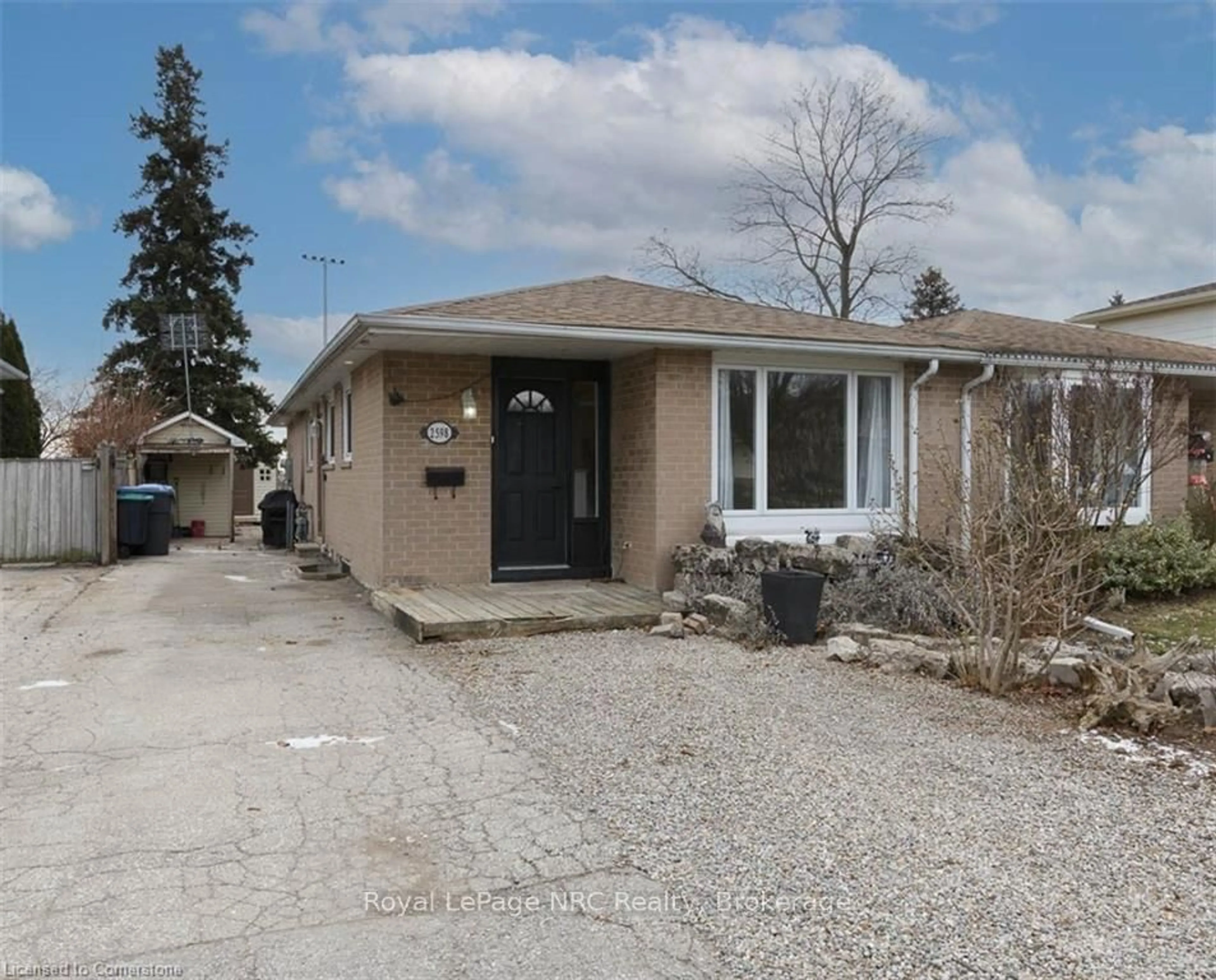 Home with brick exterior material, street for 2598 Widemarr Rd, Mississauga Ontario L5J 1M3