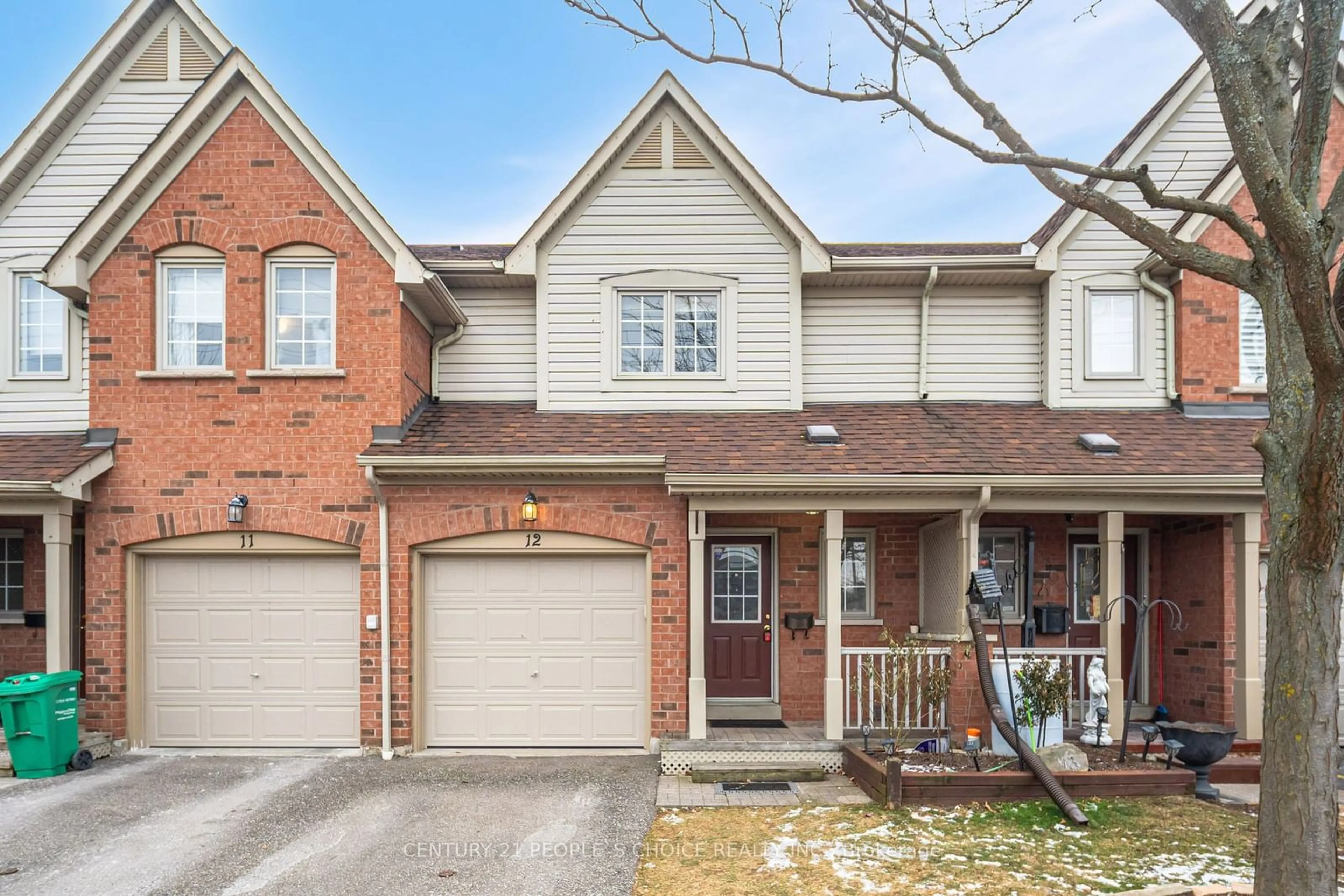 Home with brick exterior material, street for 5950 Glen Erin Dr #12, Mississauga Ontario L5M 6J1