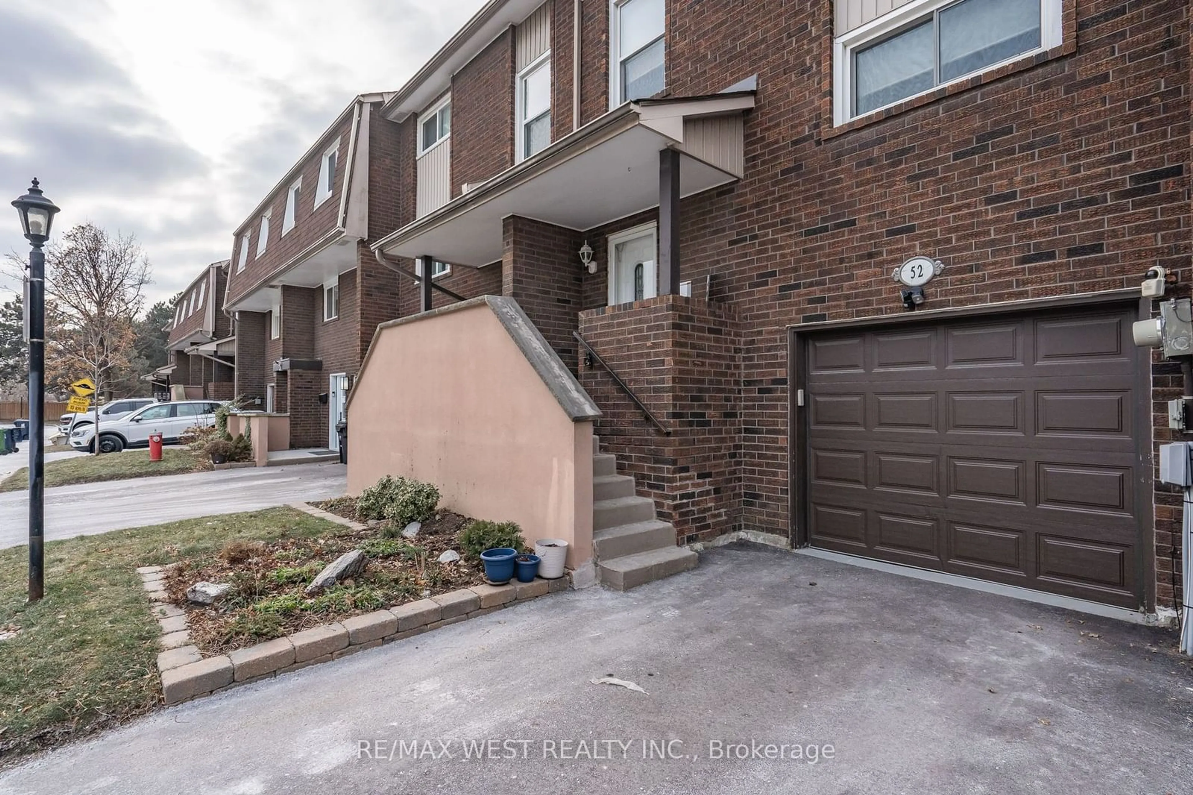 Home with brick exterior material, street for 52 Permfield Path #46, Toronto Ontario M9C 4Y5