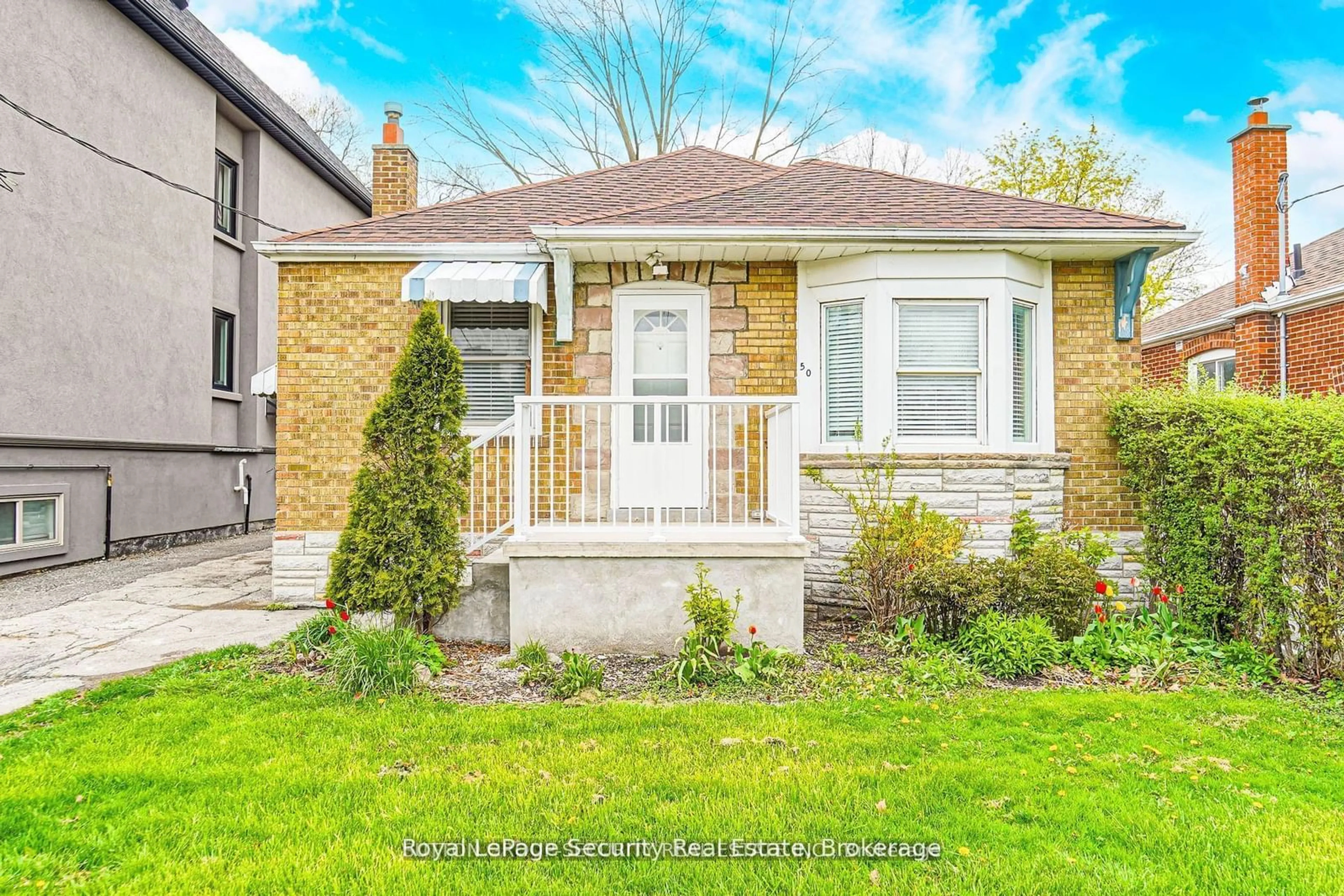 Home with brick exterior material, street for 50 William St, Toronto Ontario M9N 2G7