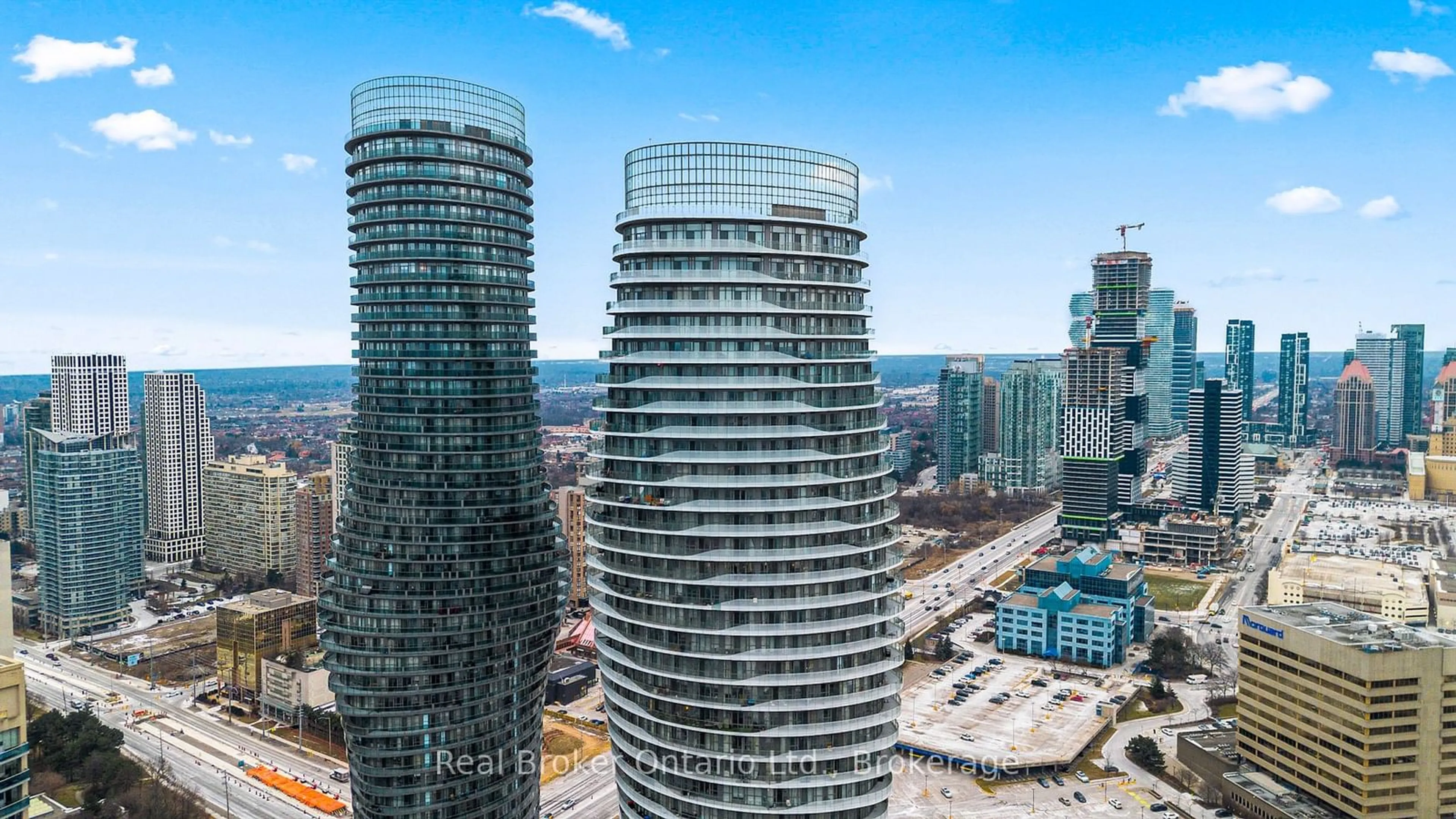 A pic from outside/outdoor area/front of a property/back of a property/a pic from drone, city buildings view from balcony for 50 Absolute Ave #3701, Mississauga Ontario L4Z 0A8