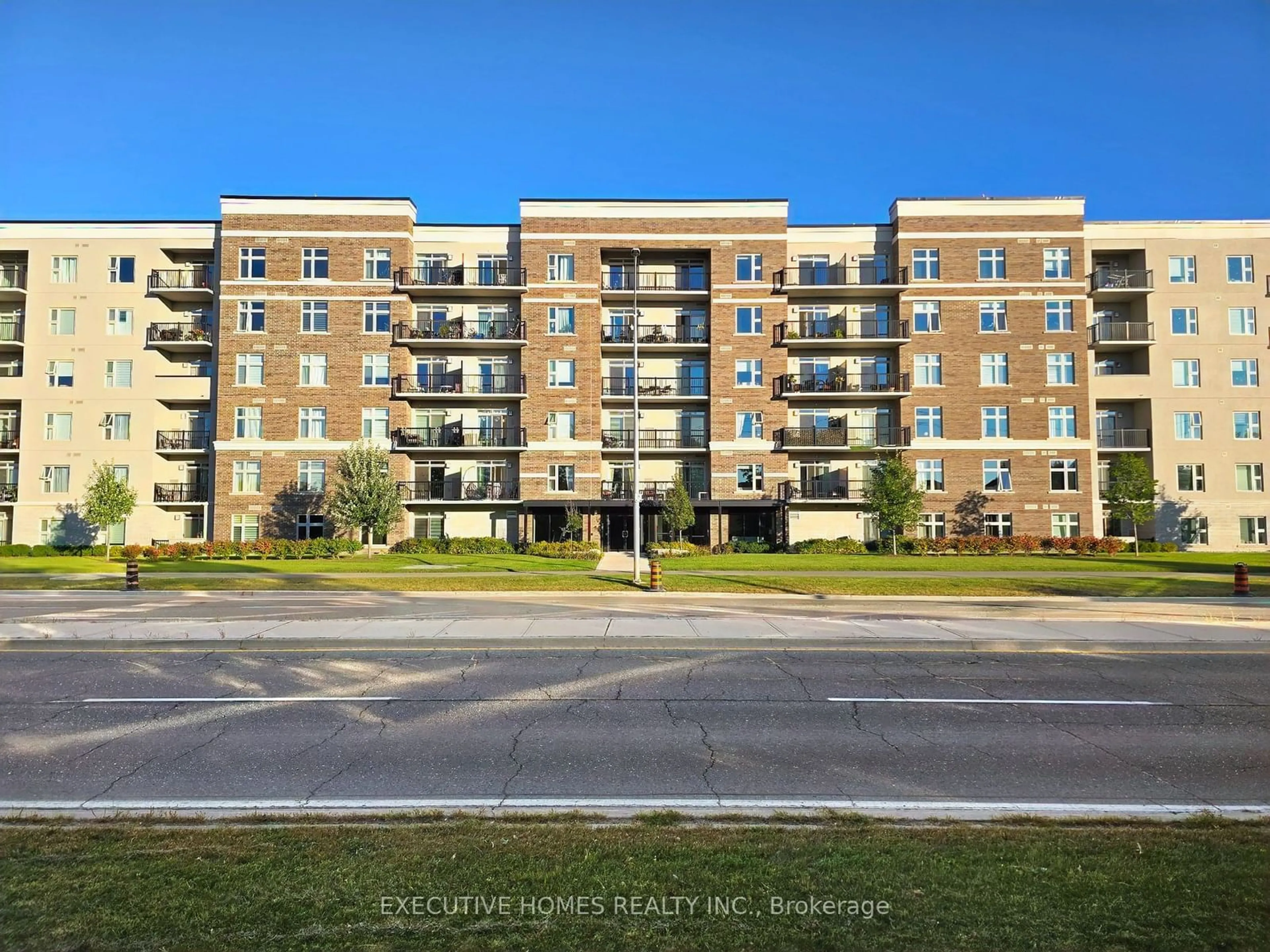 A pic from outside/outdoor area/front of a property/back of a property/a pic from drone, building for 610 Farmstead Dr #510, Milton Ontario L9T 8X5