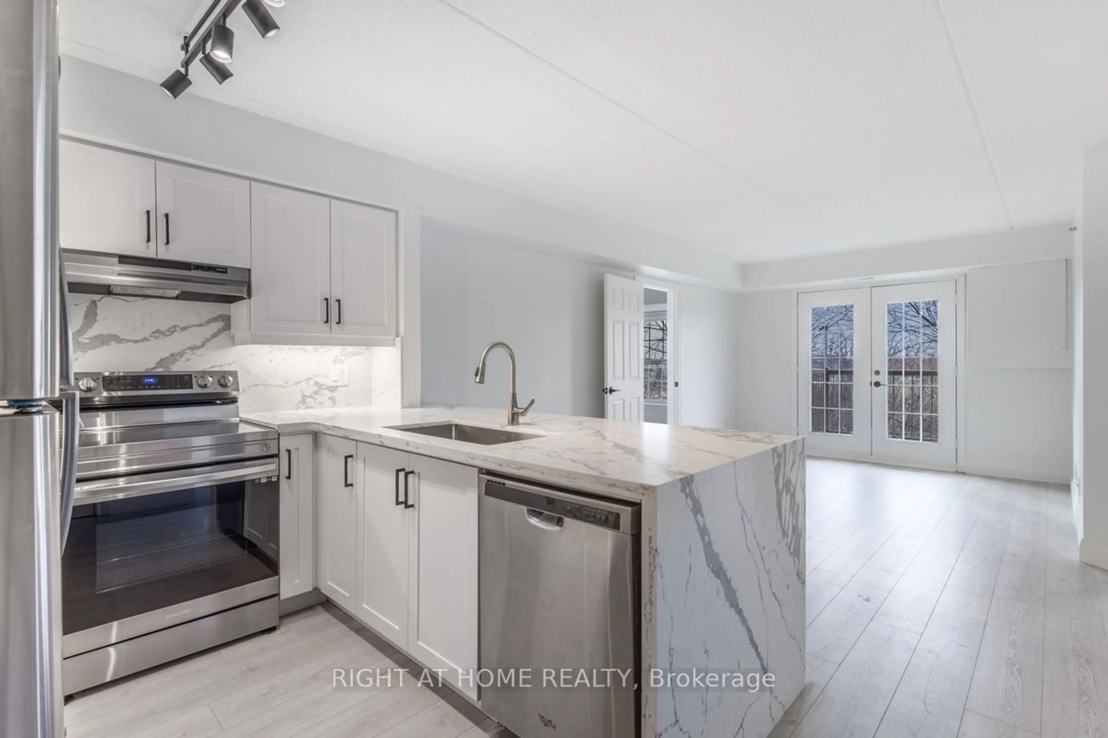 Open concept kitchen, unknown for 1470 Bishops Gate #309, Oakville Ontario L6M 4N2