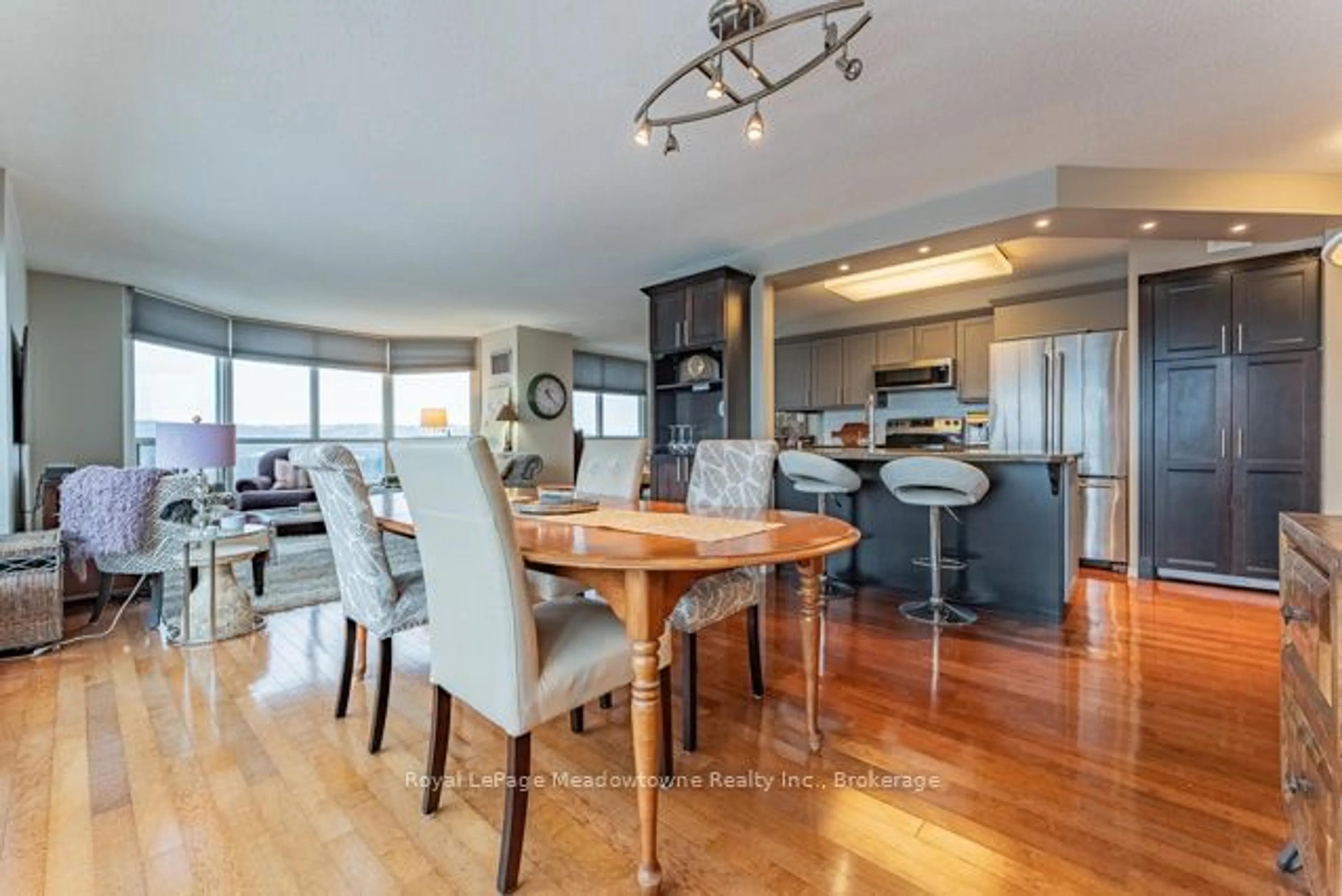 Open concept kitchen, wood/laminate floor for 100 Millside Dr #1408, Milton Ontario L9T 5E2