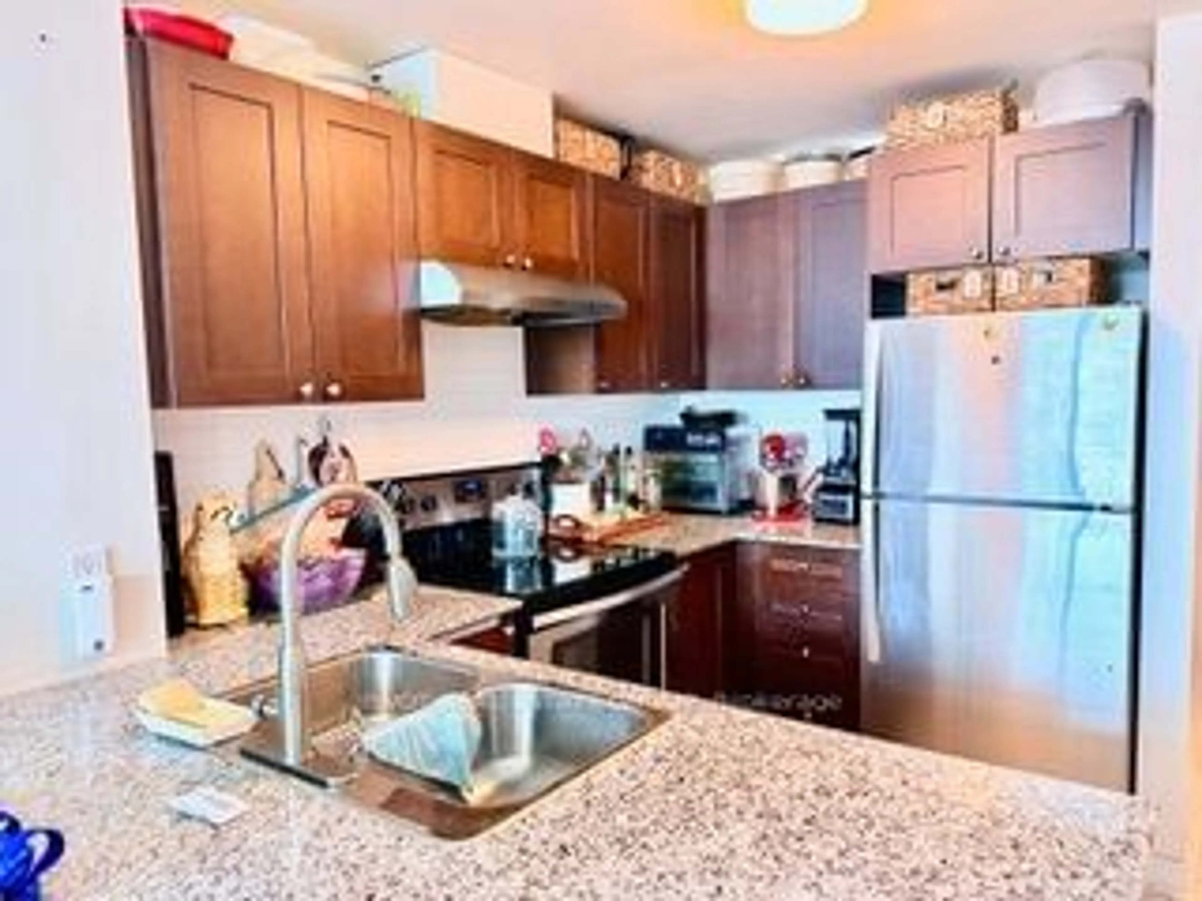 Open concept kitchen, ceramic/tile floor for 2522 Keele St #215, Toronto Ontario M6L 2N8