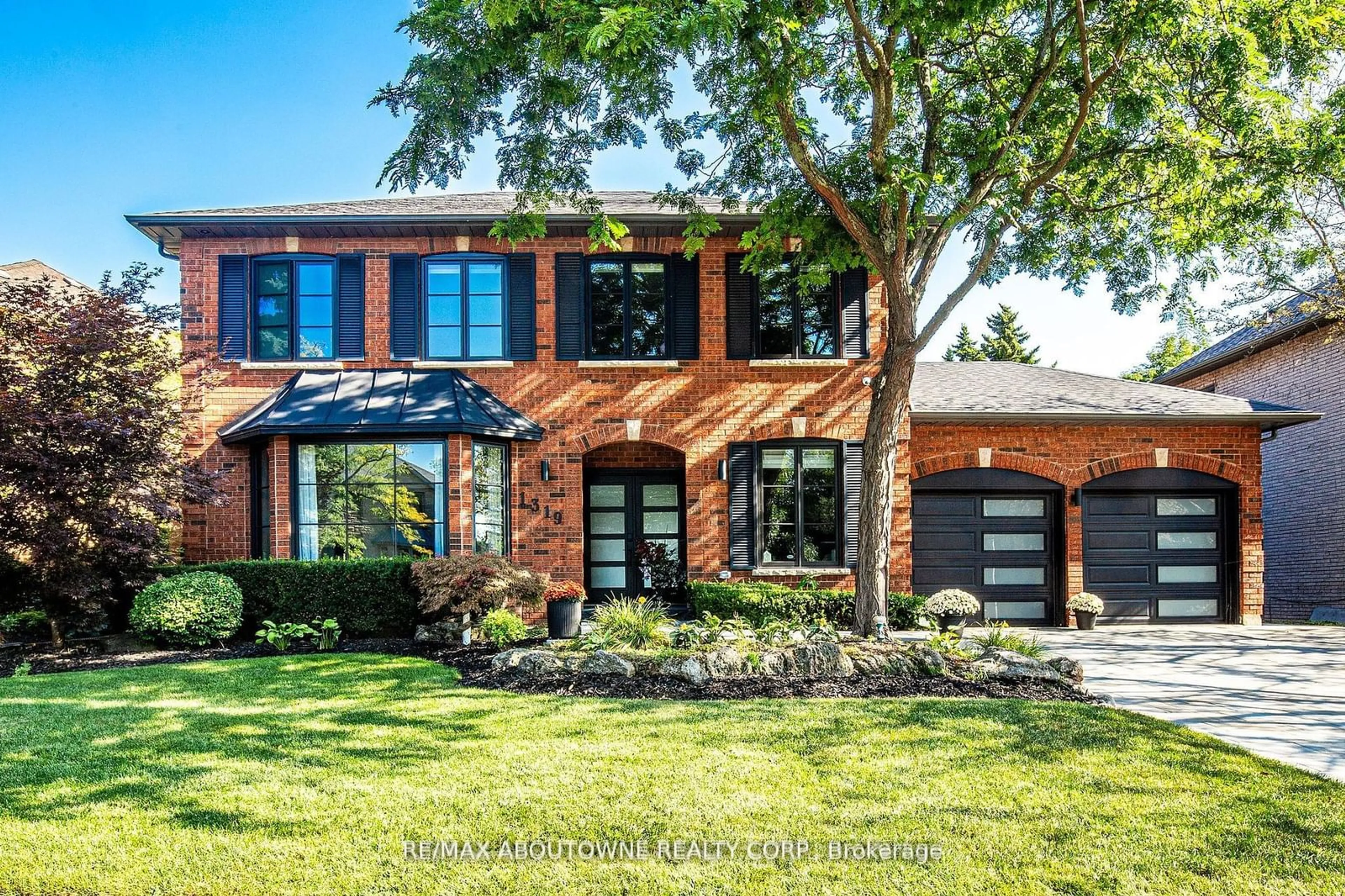 Home with brick exterior material, street for 1319 Greeneagle Dr, Oakville Ontario L6M 2N1