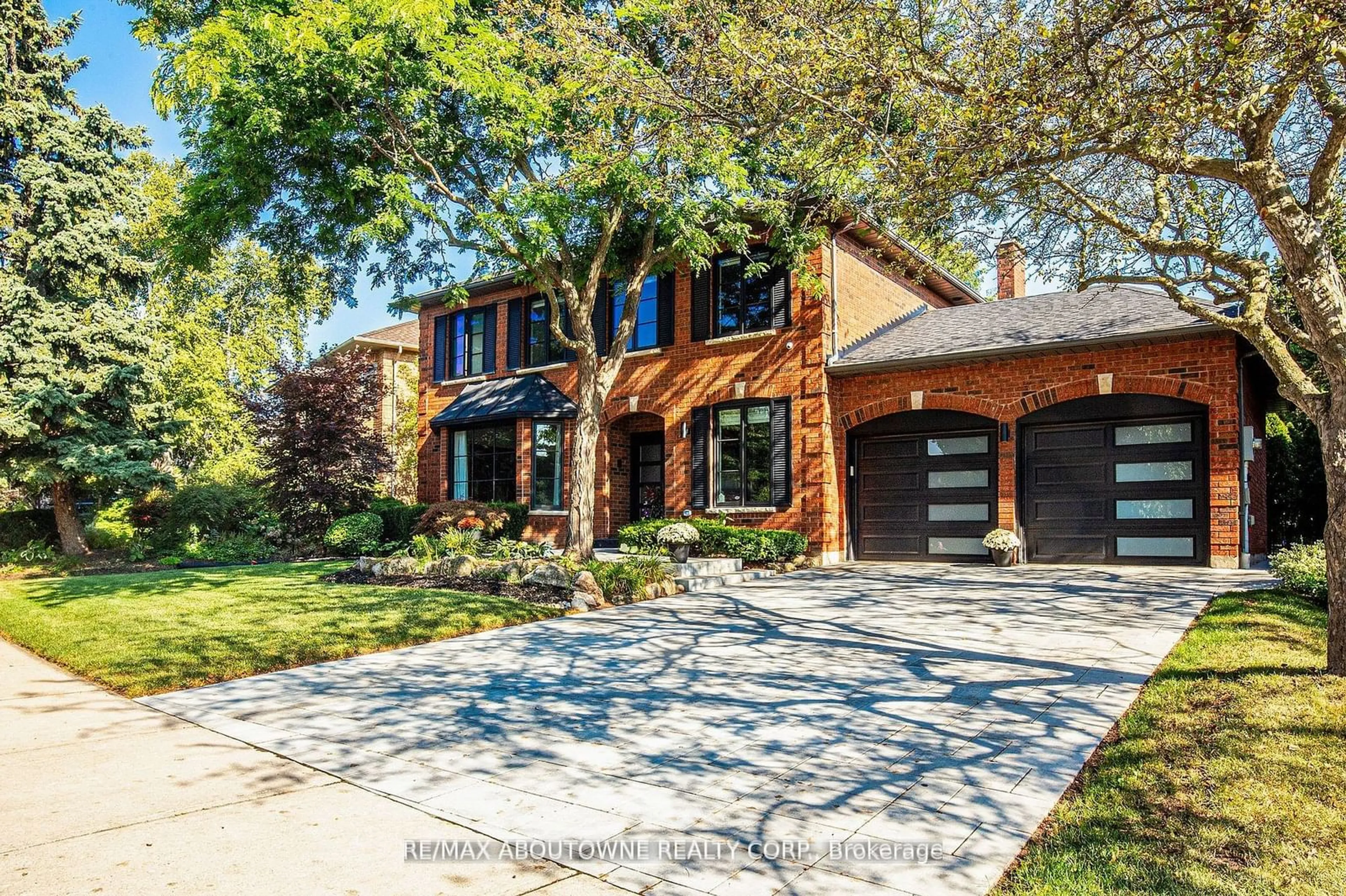 Home with brick exterior material, street for 1319 Greeneagle Dr, Oakville Ontario L6M 2N1