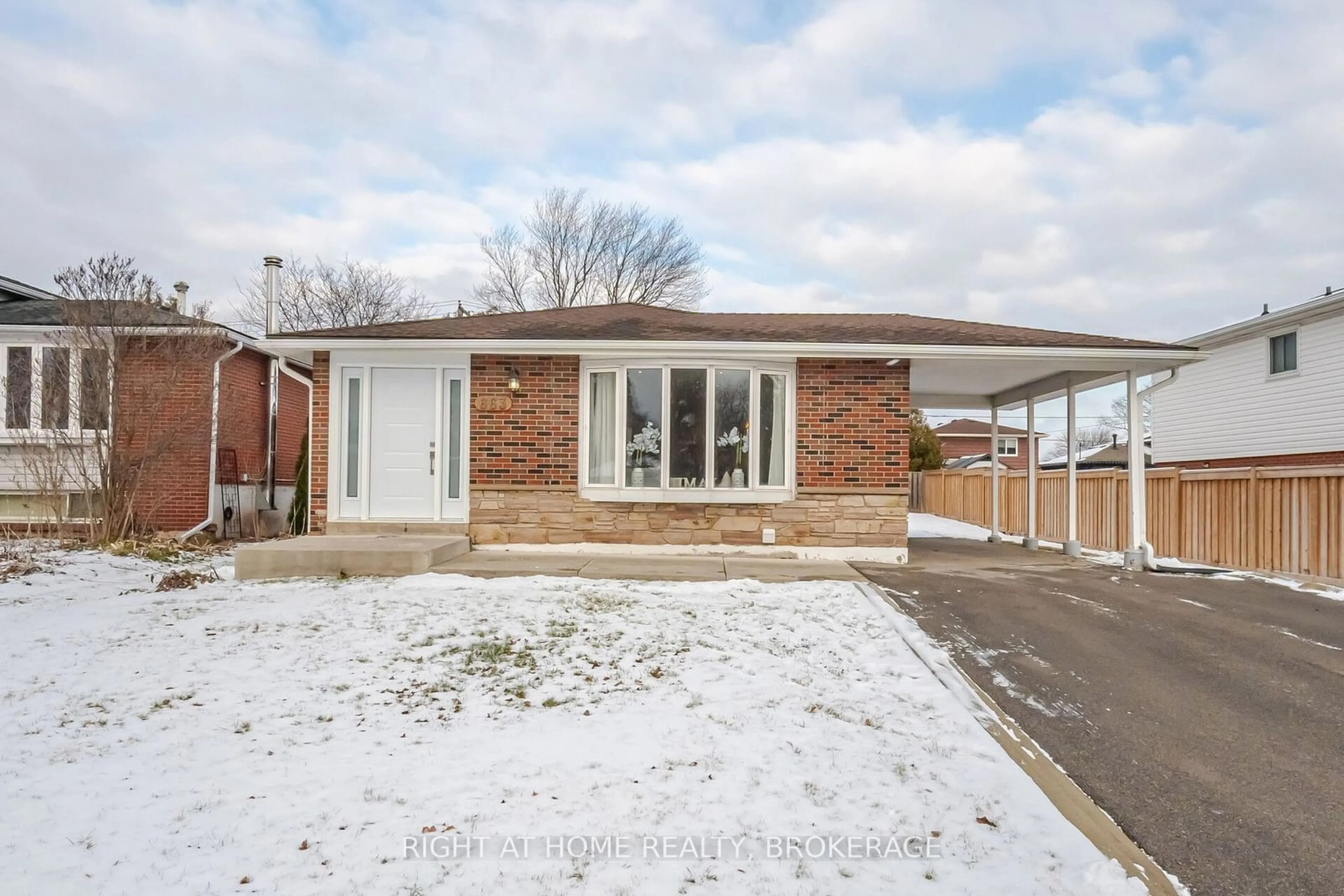 Home with brick exterior material, street for 663 Cape Ave, Burlington Ontario L7L 4M5