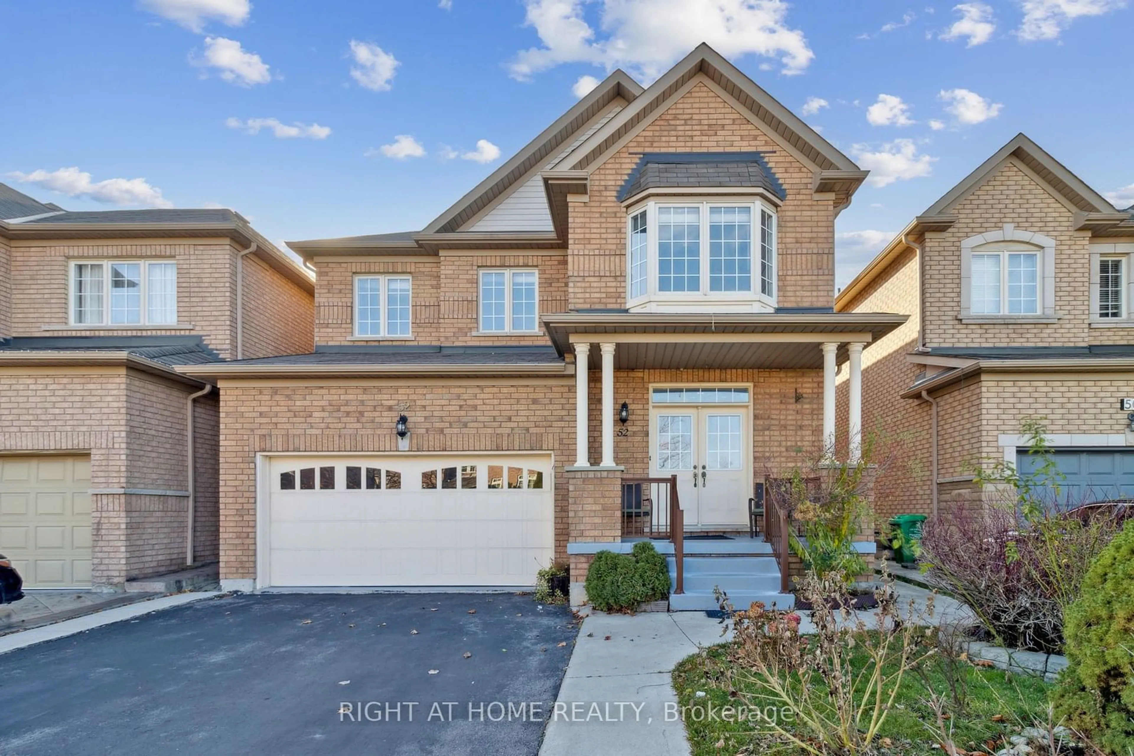 Home with brick exterior material, street for 52 Runnymede Cres, Brampton Ontario L6R 0L2