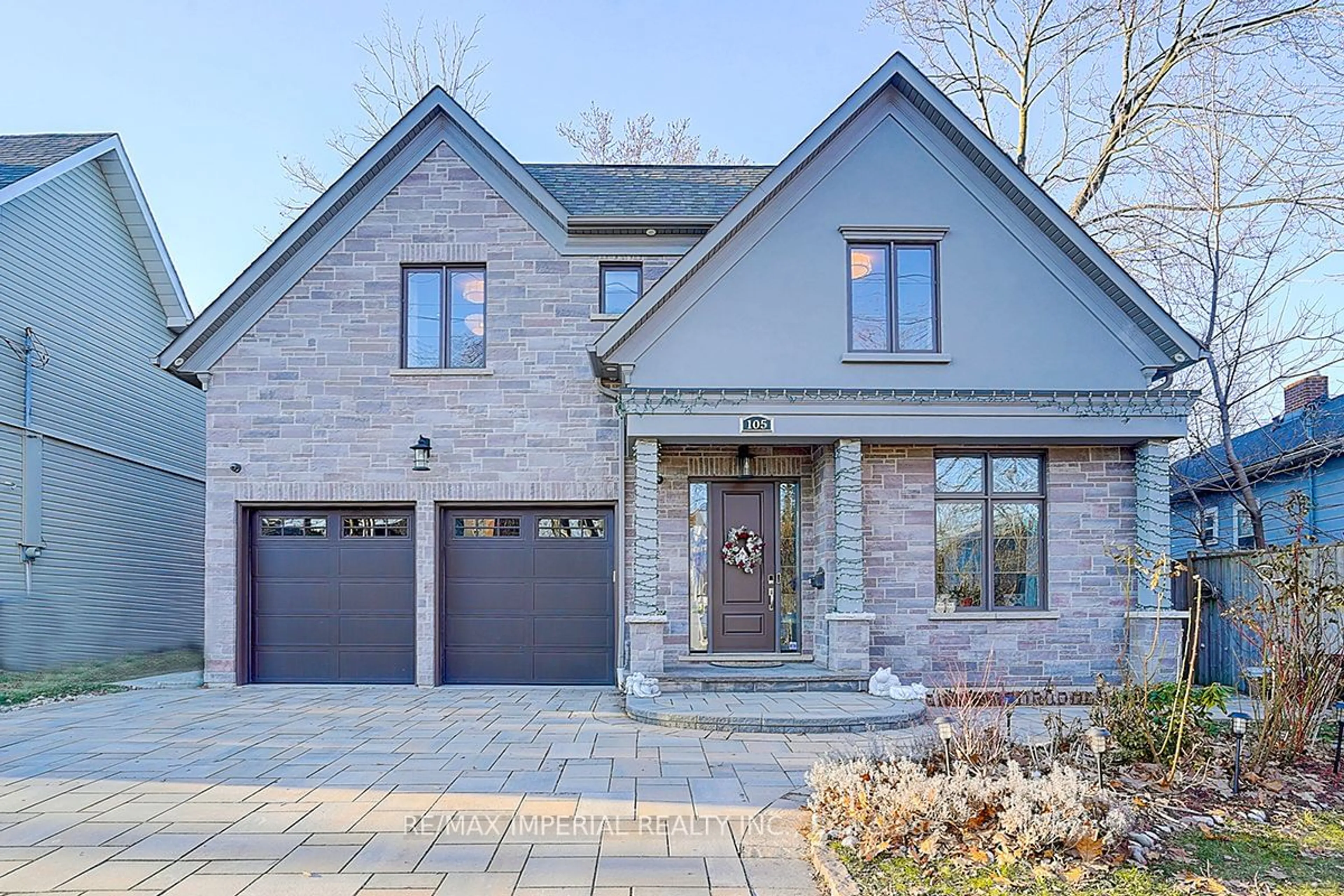 Home with brick exterior material, street for 105 Eaglewood Blvd, Mississauga Ontario L5G 1V8