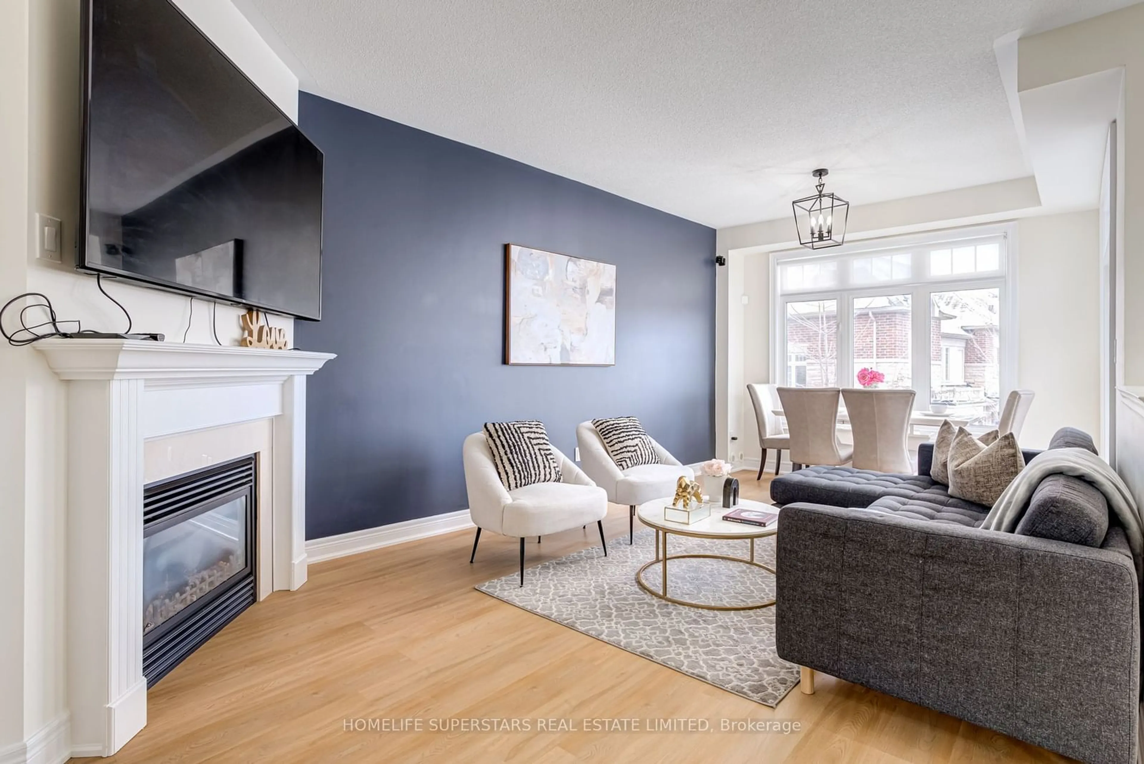 Living room with furniture, wood/laminate floor for 2016 Lakeshore Rd, Mississauga Ontario L5J 1J8