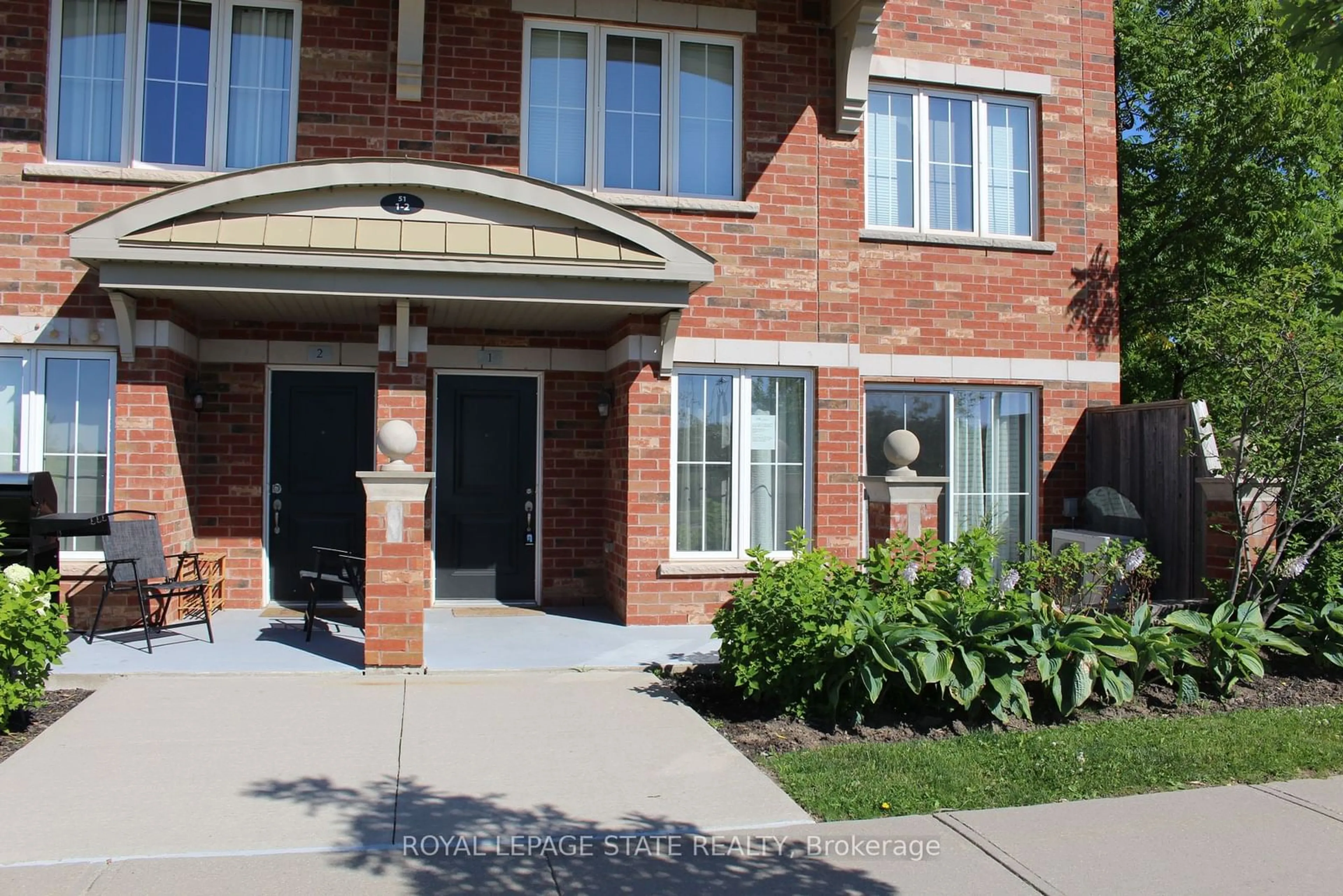 Home with brick exterior material, street for 51 Hays Blvd #1, Oakville Ontario L6H 0J1