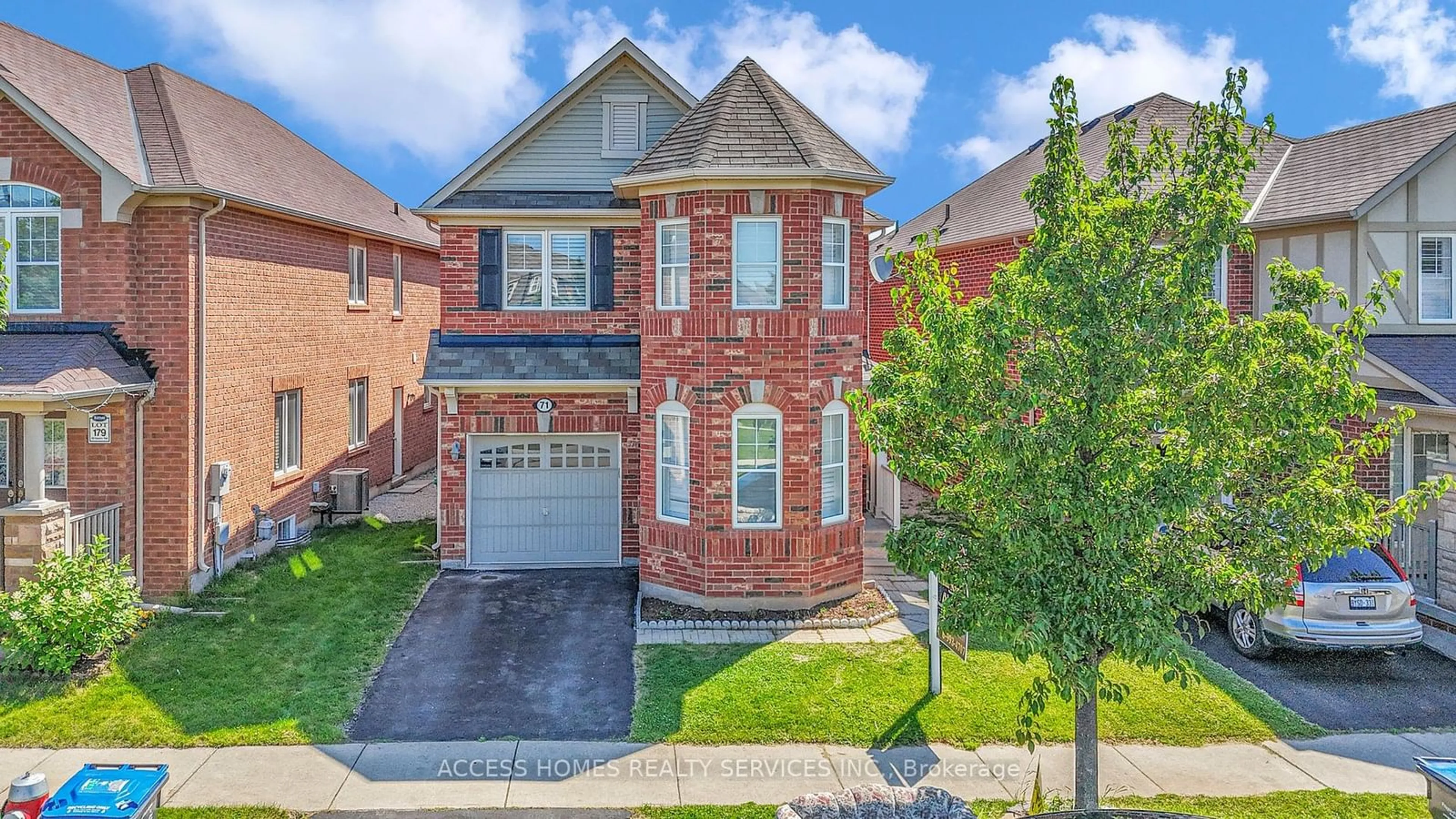 Home with brick exterior material, street for 71 Haverty Tr, Brampton Ontario L7A 0S4