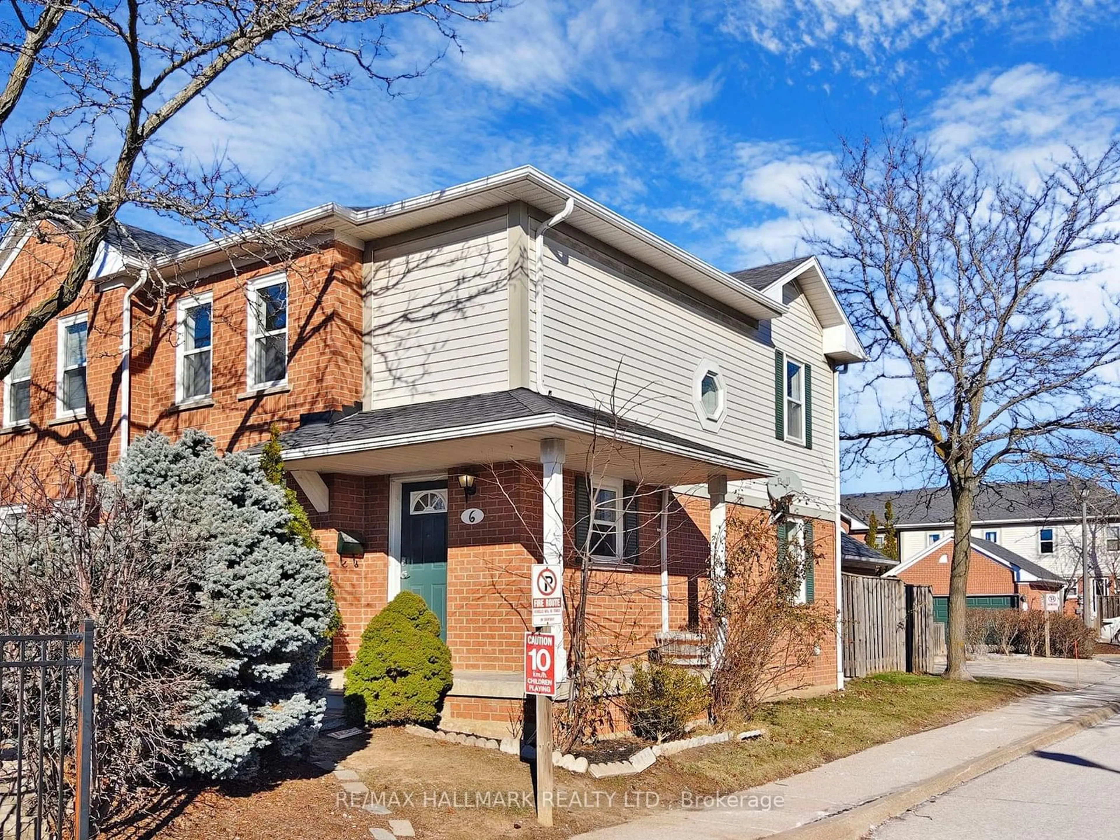 Home with brick exterior material, street for 5659 Glen Erin Dr #6, Mississauga Ontario L5M 5J2