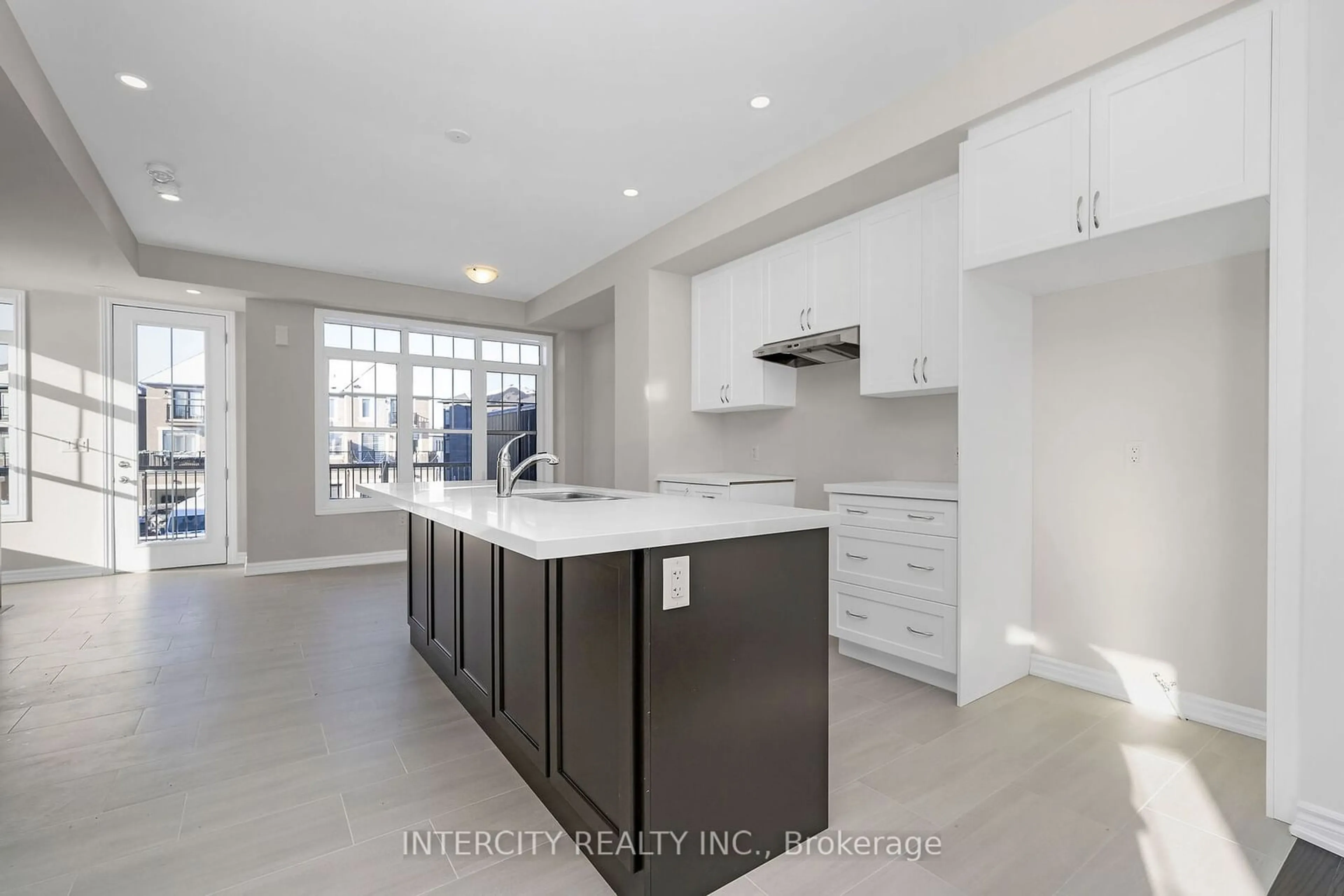 Open concept kitchen, ceramic/tile floor for 386 Tim Manley Ave #1, Caledon Ontario L7C 1Z9