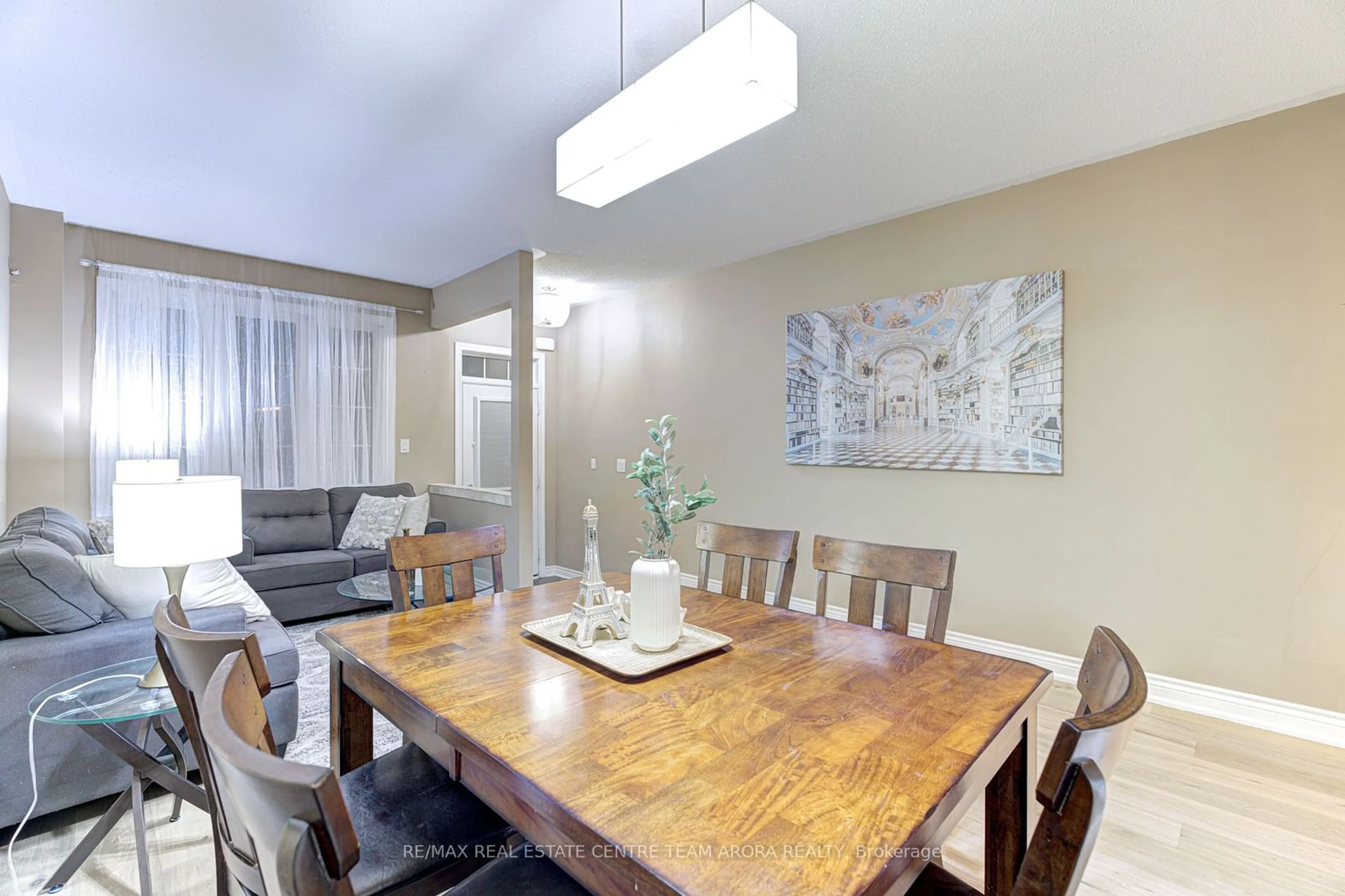 Dining room, wood/laminate floor for 8 Kawana Rd, Brampton Ontario L6Y 0W1