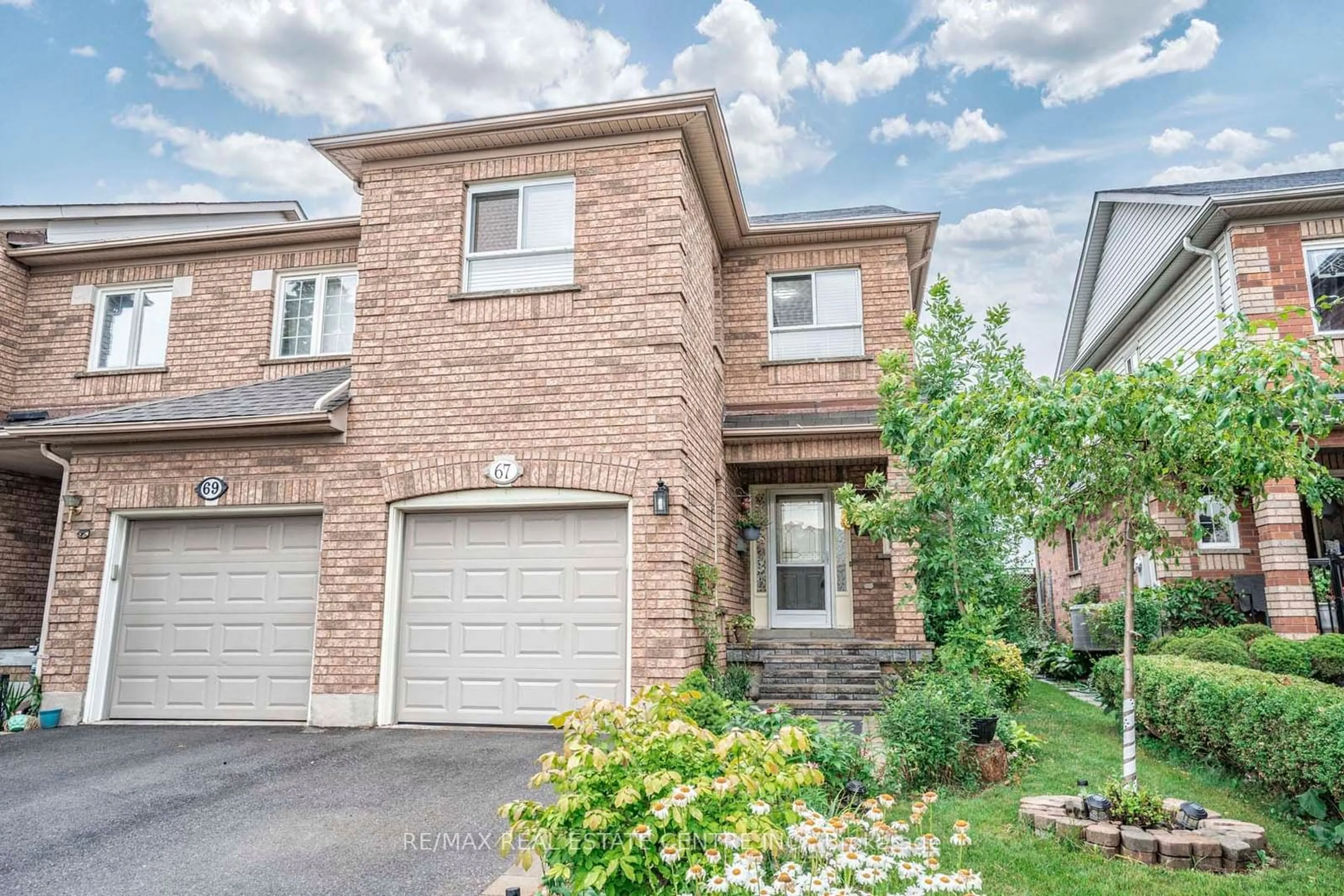 Home with brick exterior material, street for 67 Quarry Edge Dr, Brampton Ontario L6V 4L5