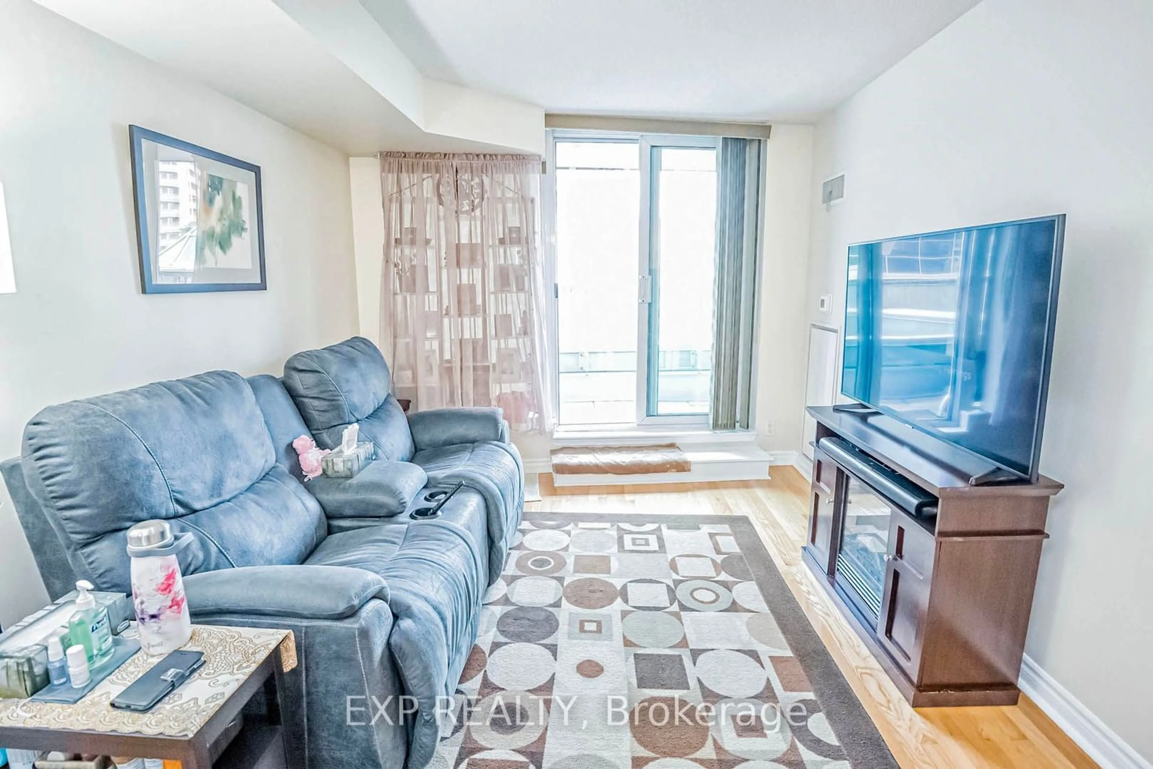 Living room with furniture, unknown for 33 Elm Dr #310, Mississauga Ontario L5B 4M2