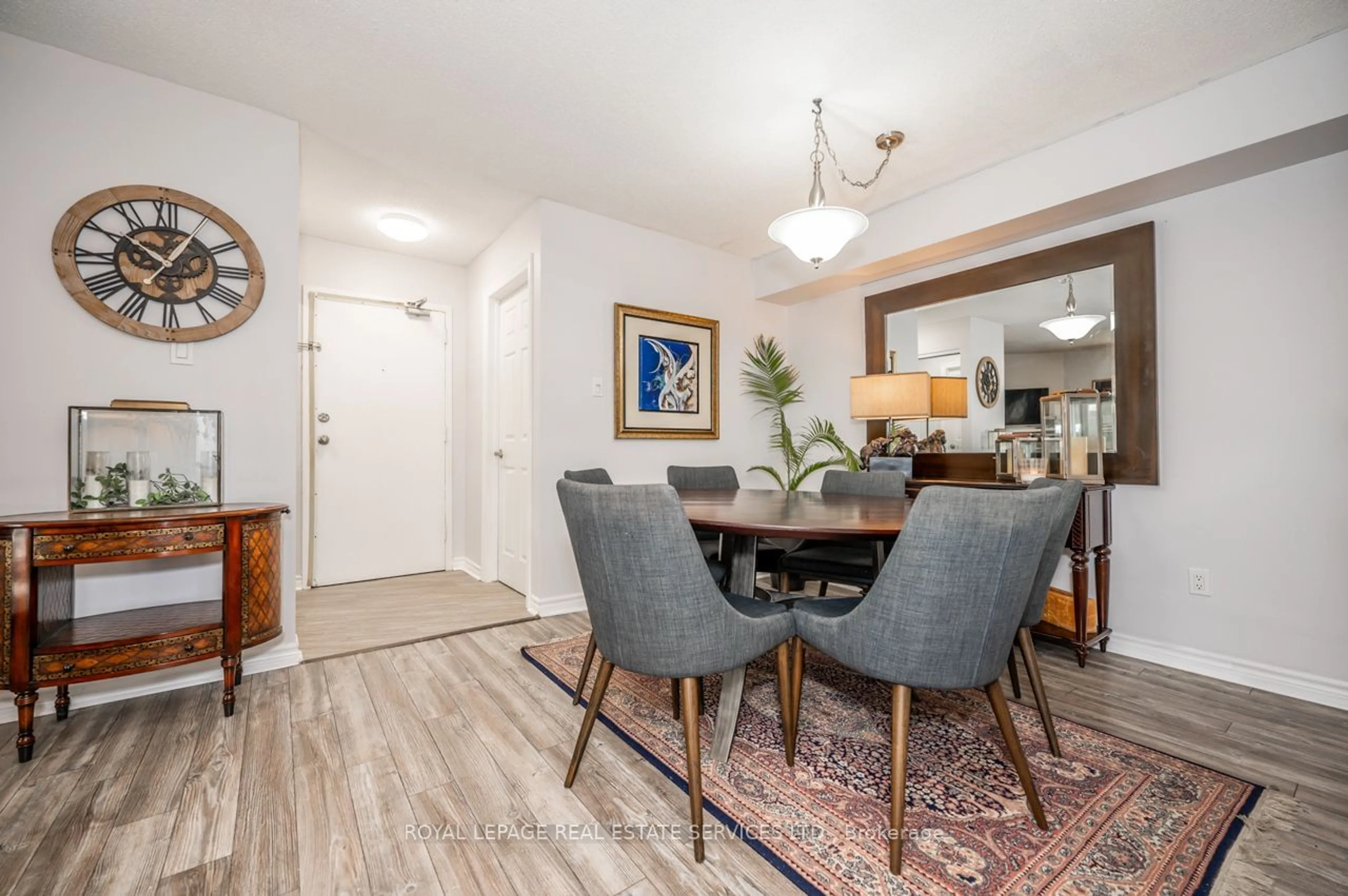 Dining room, wood/laminate floor for 1450 Glen Abbey Gate #1013, Oakville Ontario L6M 2V7