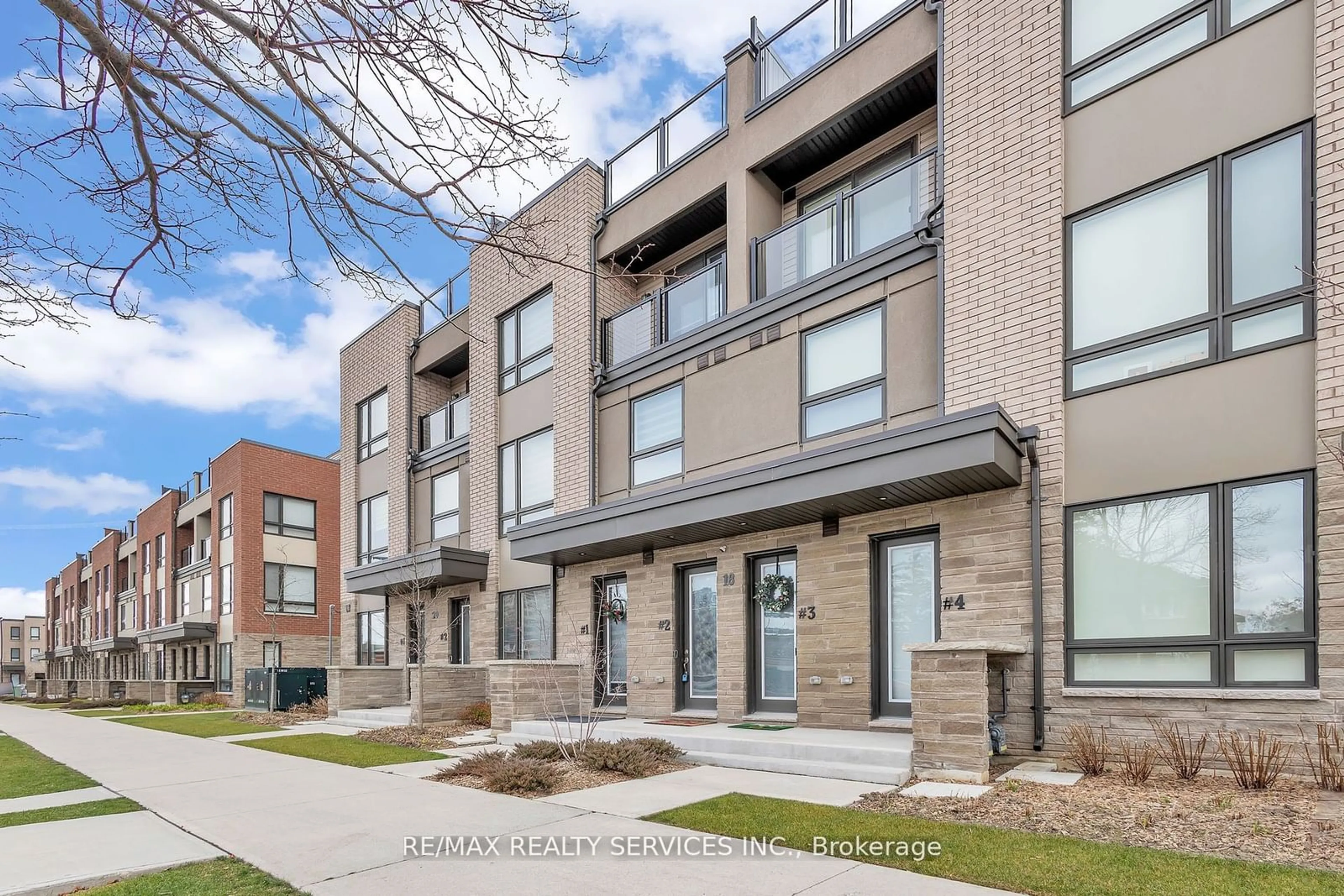 Home with brick exterior material, street for 18 Humberwood Blvd #2, Toronto Ontario M9W 7J6