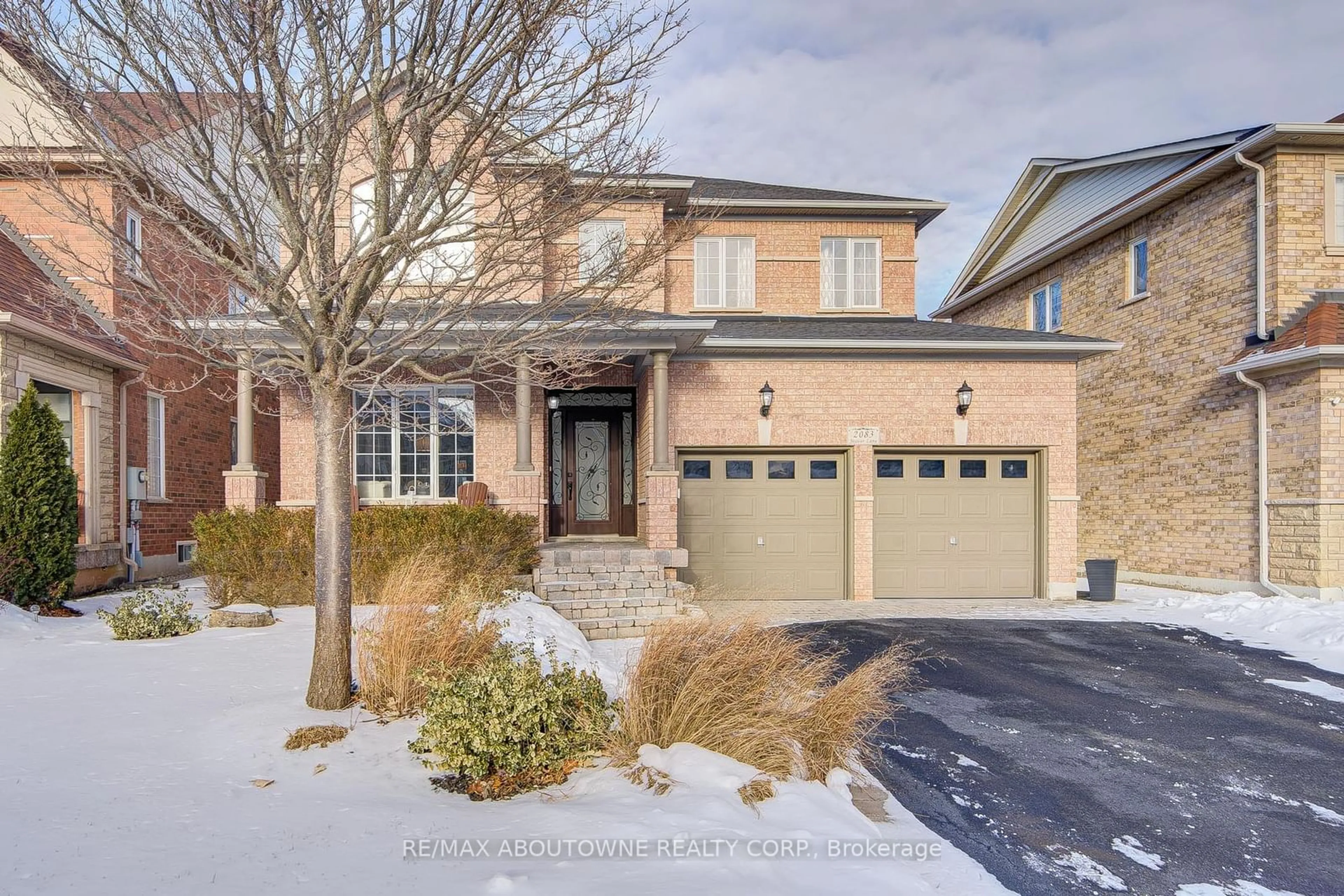 Home with brick exterior material, street for 2083 Jaguar Lane, Oakville Ontario L6M 4R5