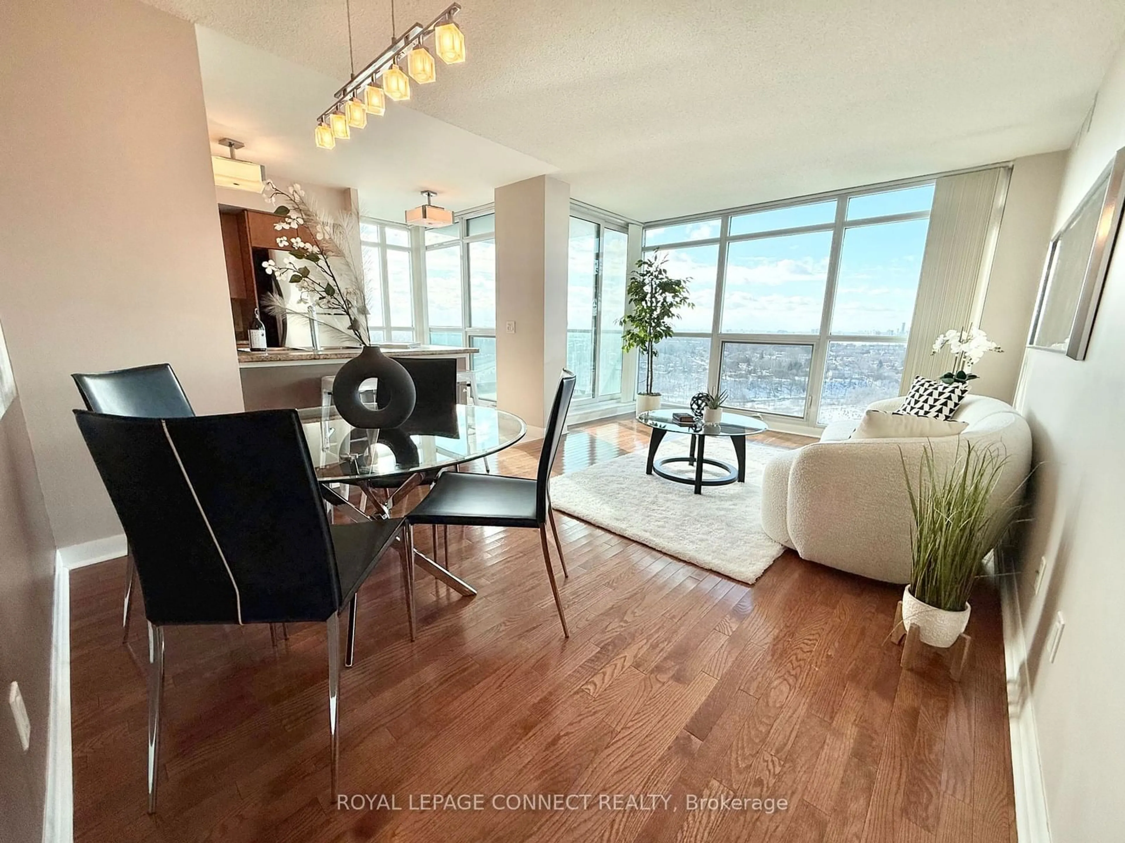 Living room with furniture, wood/laminate floor for 225 Sherway Gardens Rd #1809, Toronto Ontario M9C 0A3