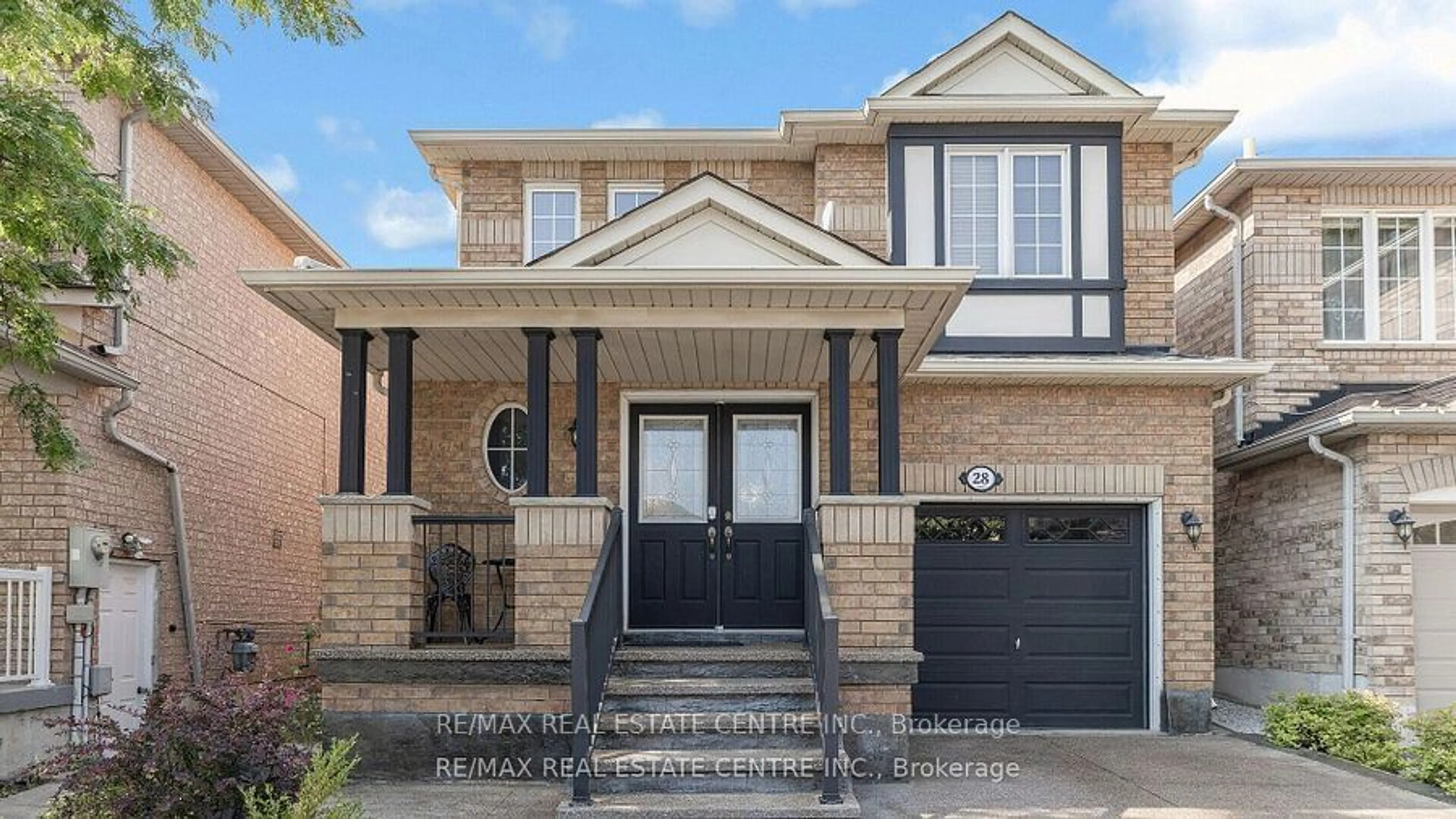 Home with brick exterior material, street for 28 Slessor Lane, Brampton Ontario L6P 1L8