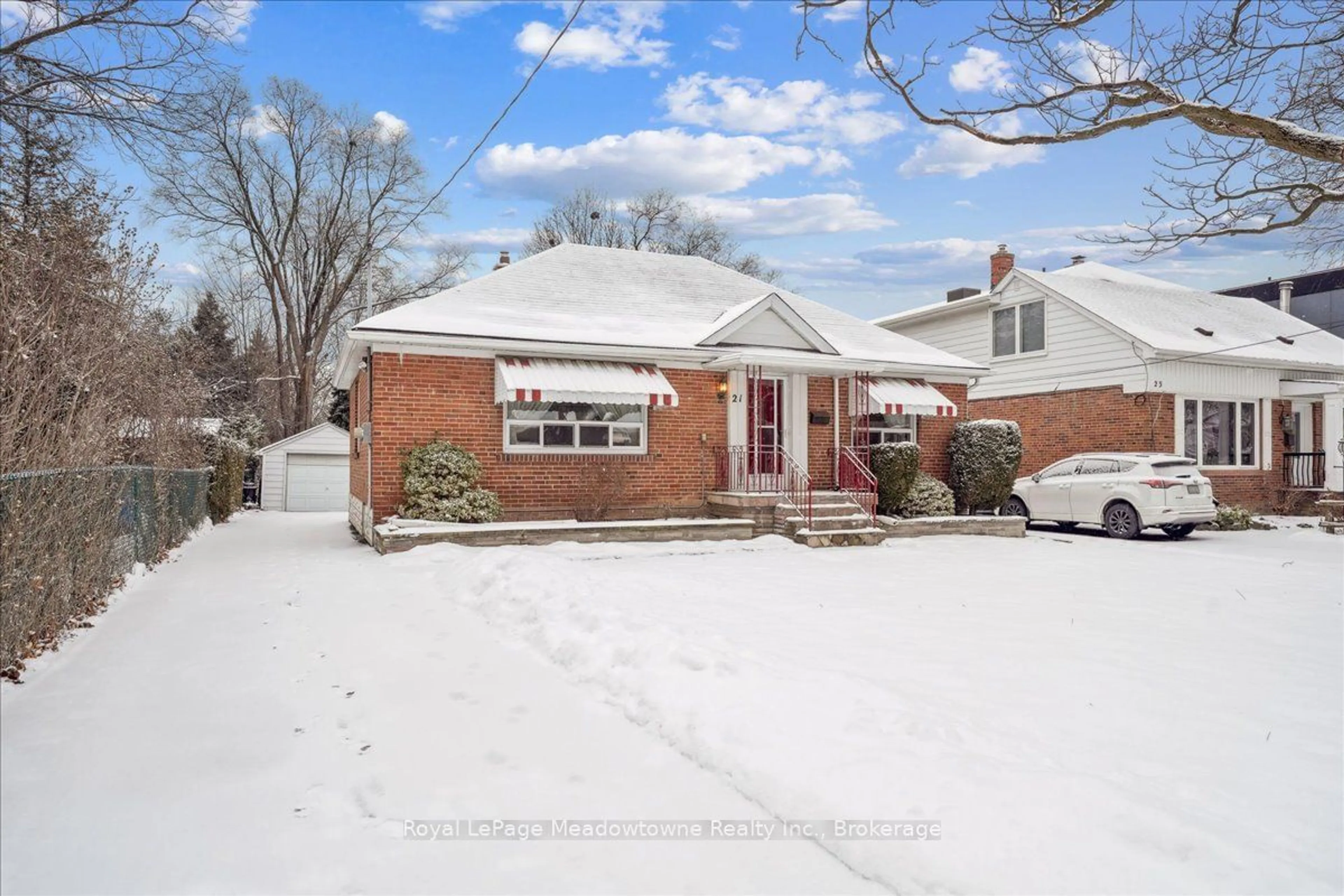 Home with brick exterior material, street for 21 Shaver Ave, Toronto Ontario M9B 3S9