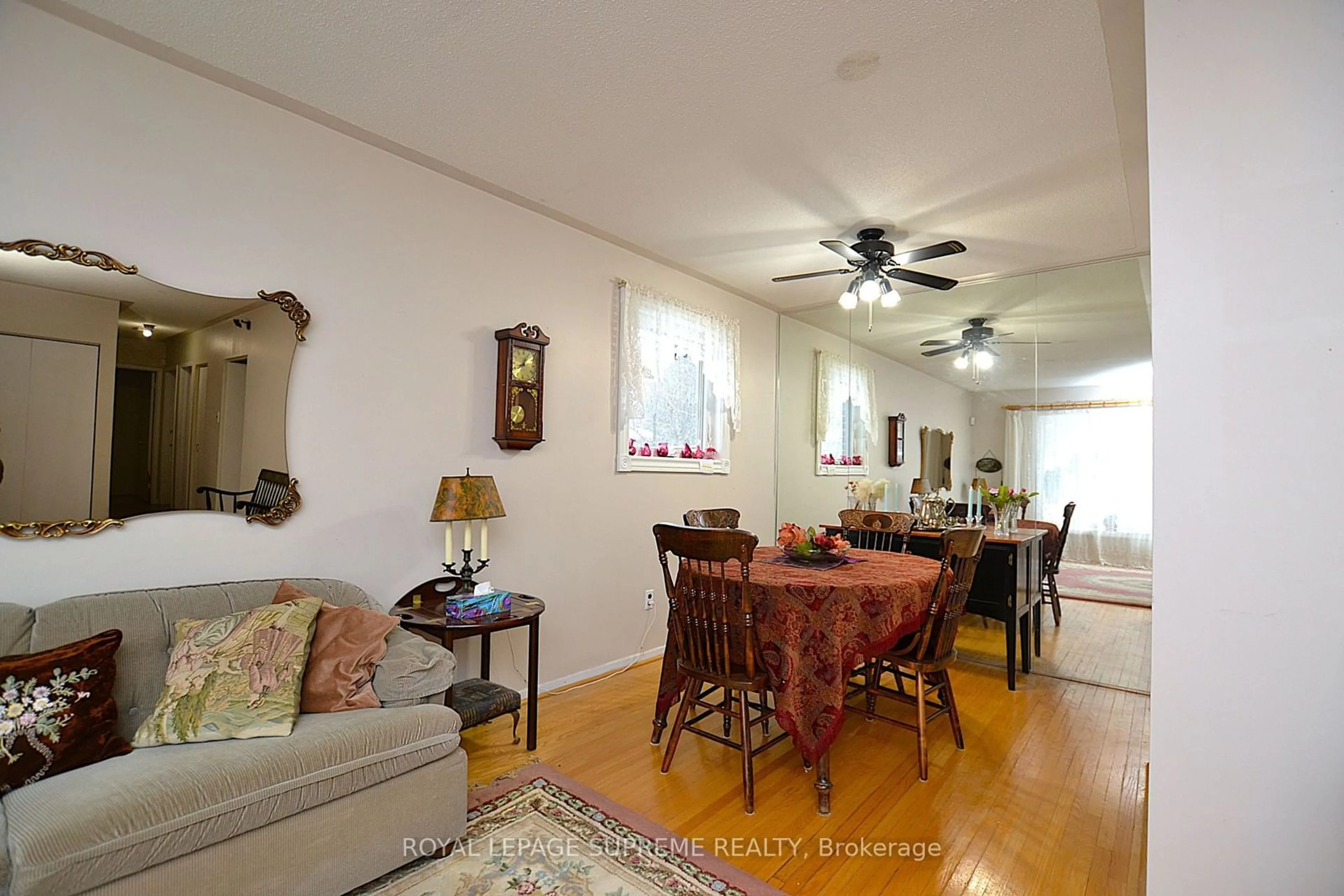 Dining room, wood/laminate floor for 25 Brookland Dr, Brampton Ontario L6T 2M4