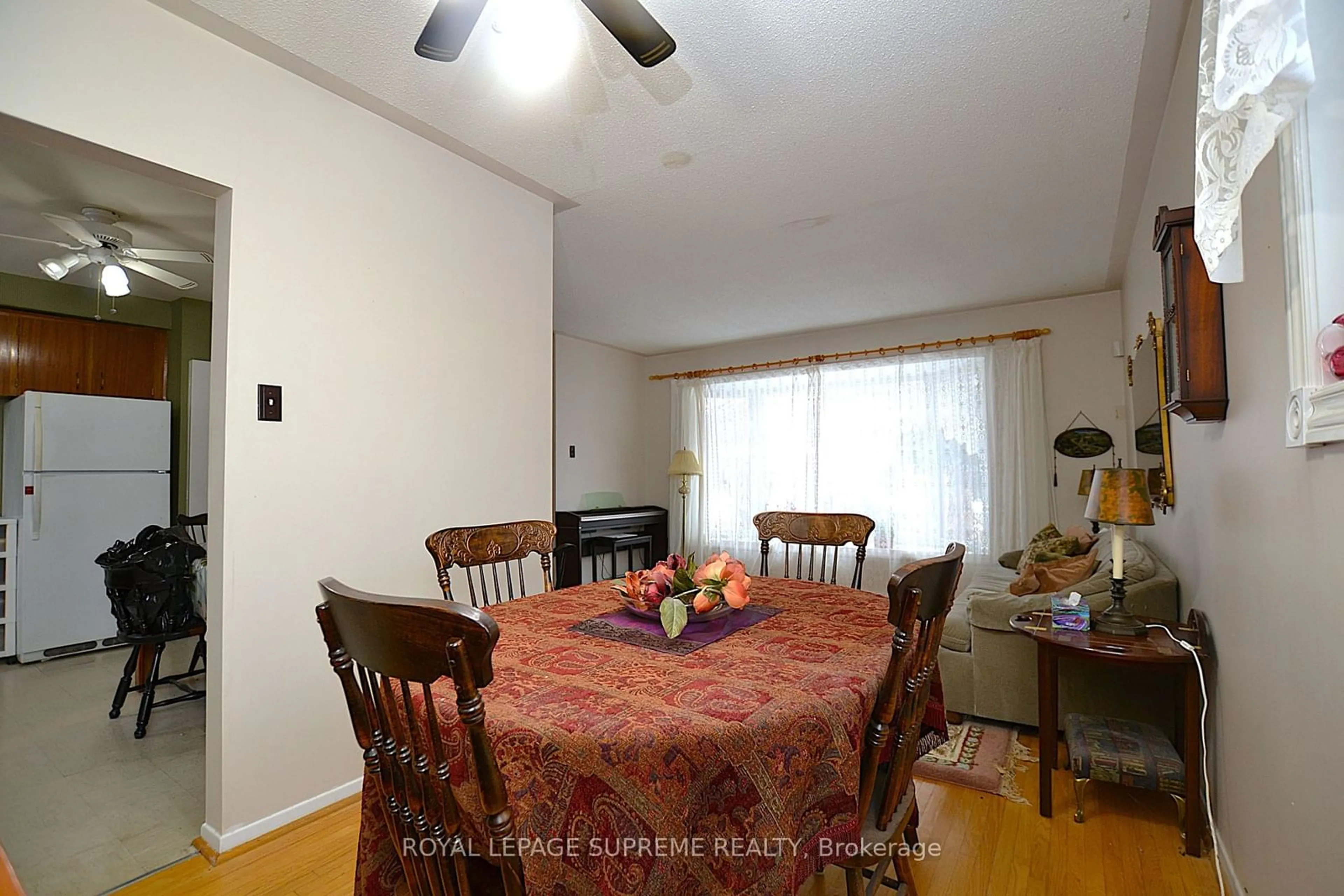 Dining room, wood/laminate floor for 25 Brookland Dr, Brampton Ontario L6T 2M4