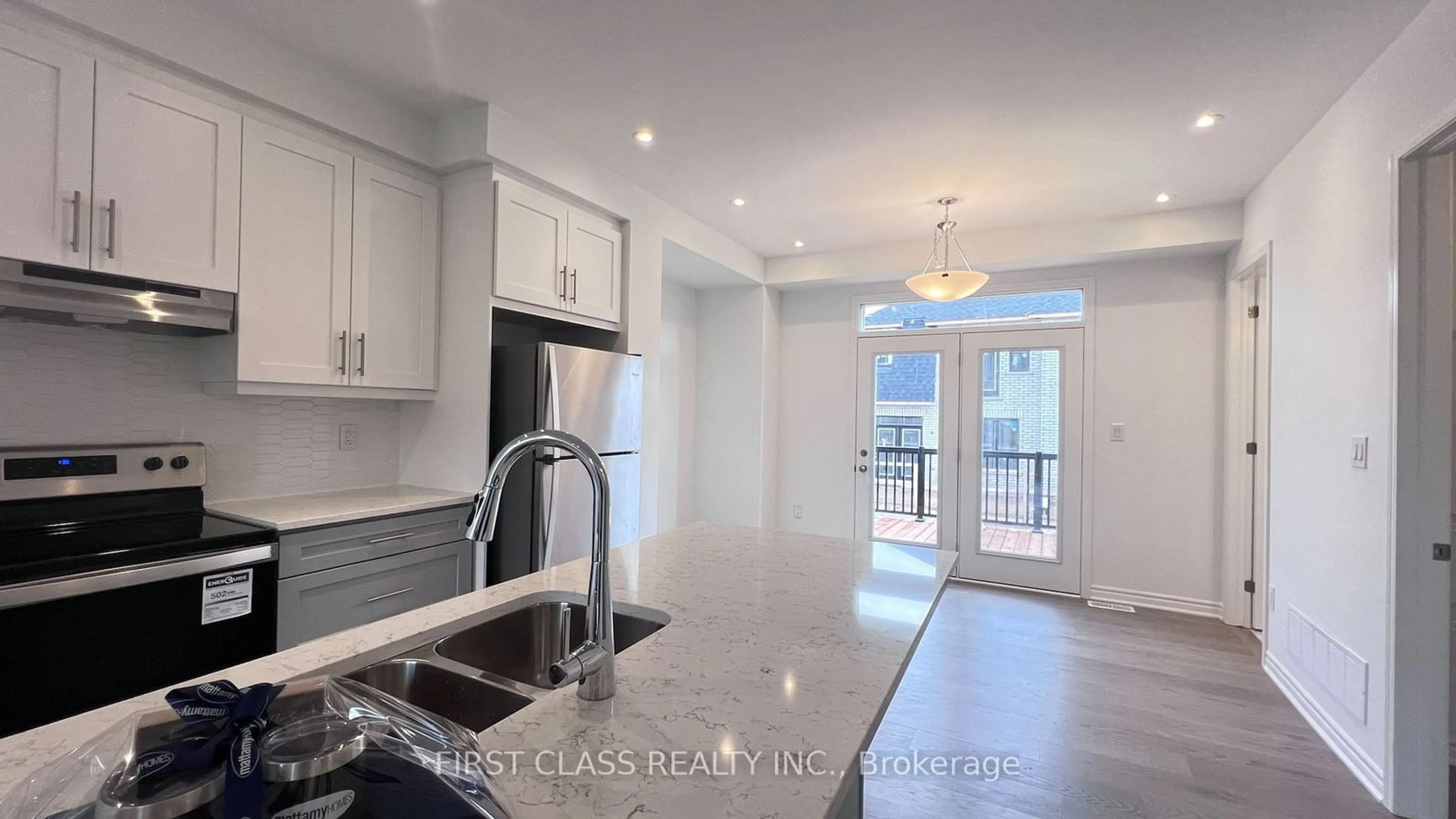 Open concept kitchen, ceramic/tile floor for 136 Marigold Gdns, Oakville Ontario L6H 7X7