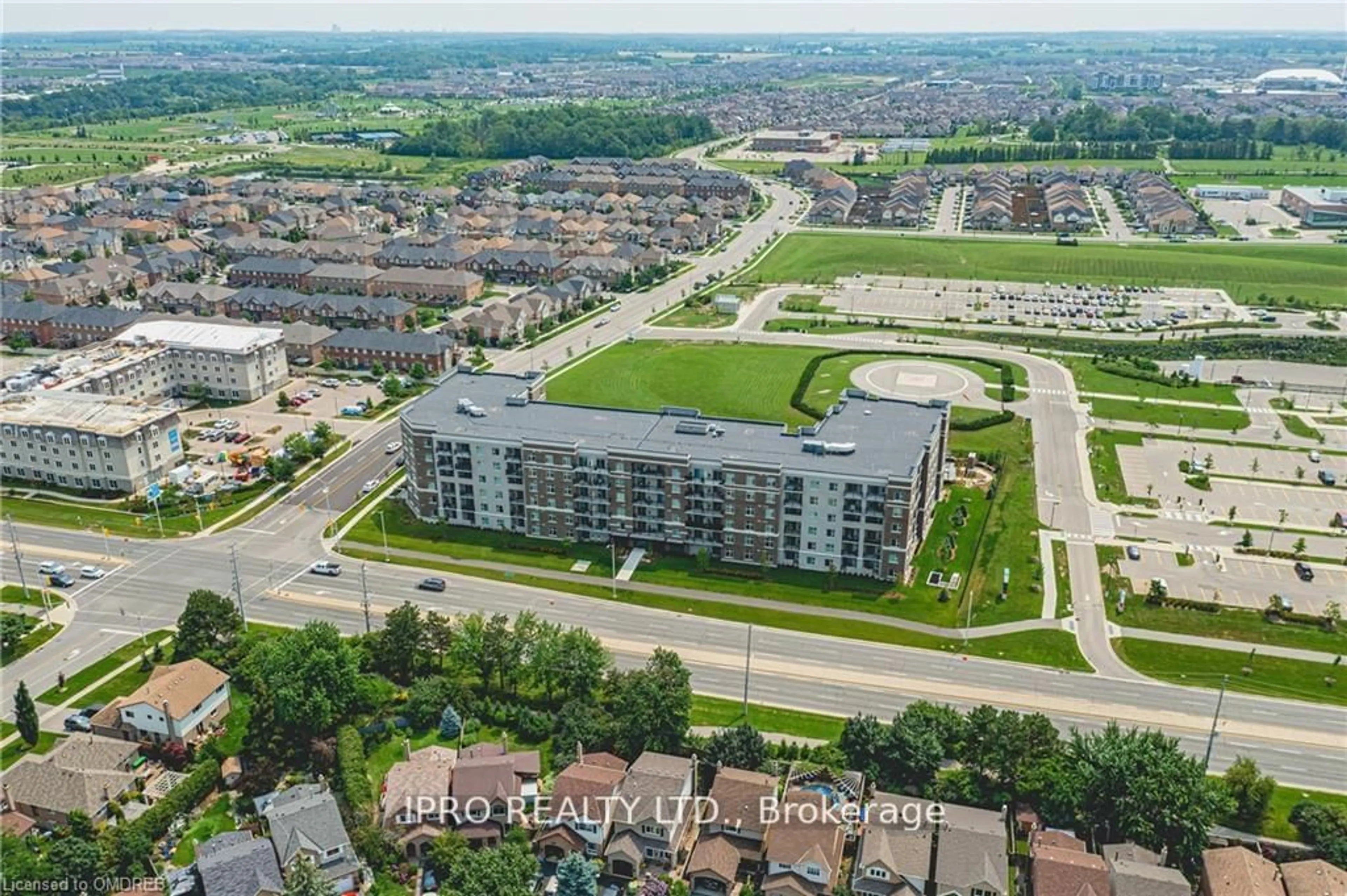 A pic from outside/outdoor area/front of a property/back of a property/a pic from drone, city buildings view from balcony for 610 Farmstead Dr #628, Milton Ontario L9T 8X5