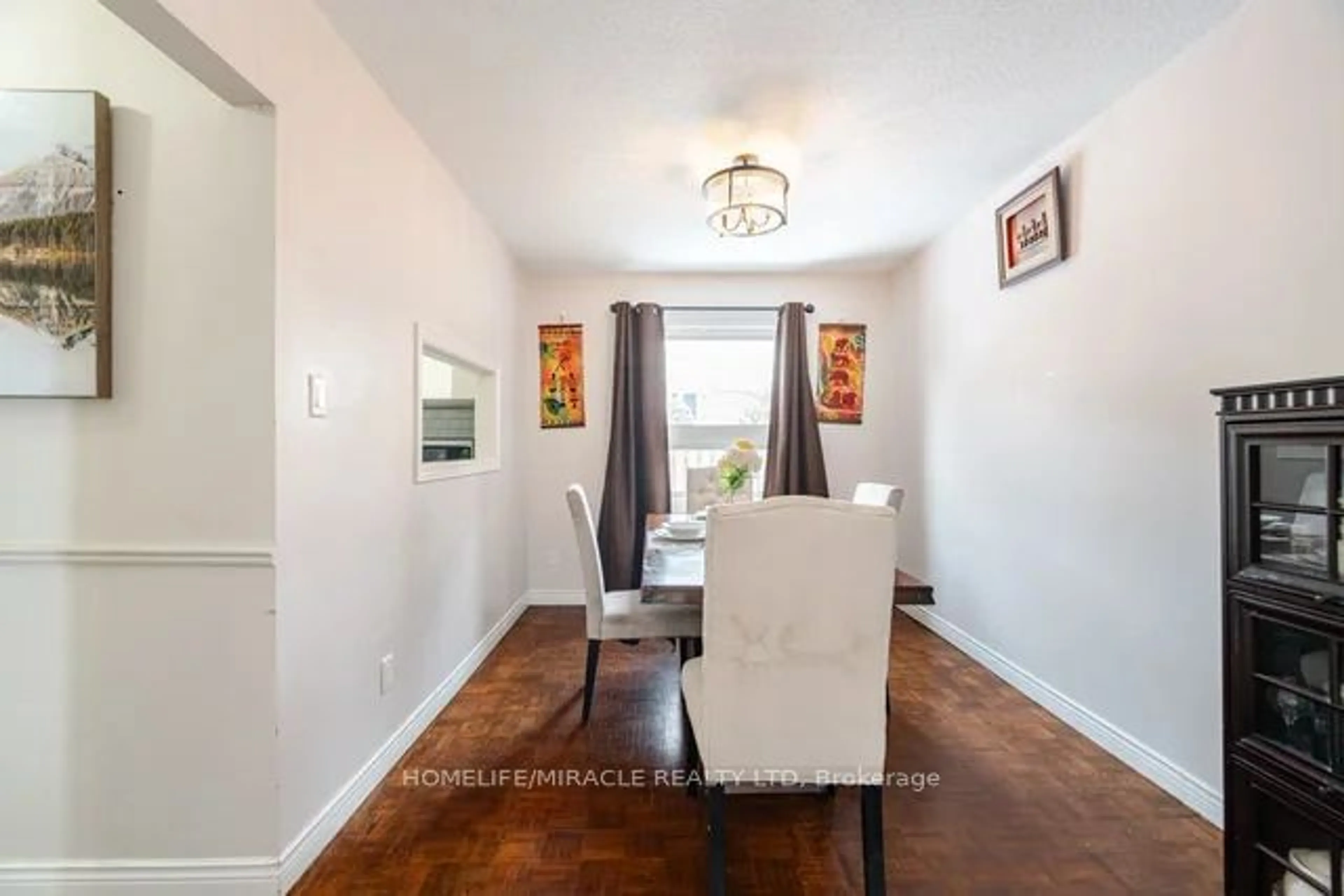 Dining room, wood/laminate floor for 7080 Copenhagen Rd #73, Mississauga Ontario L5N 2C9