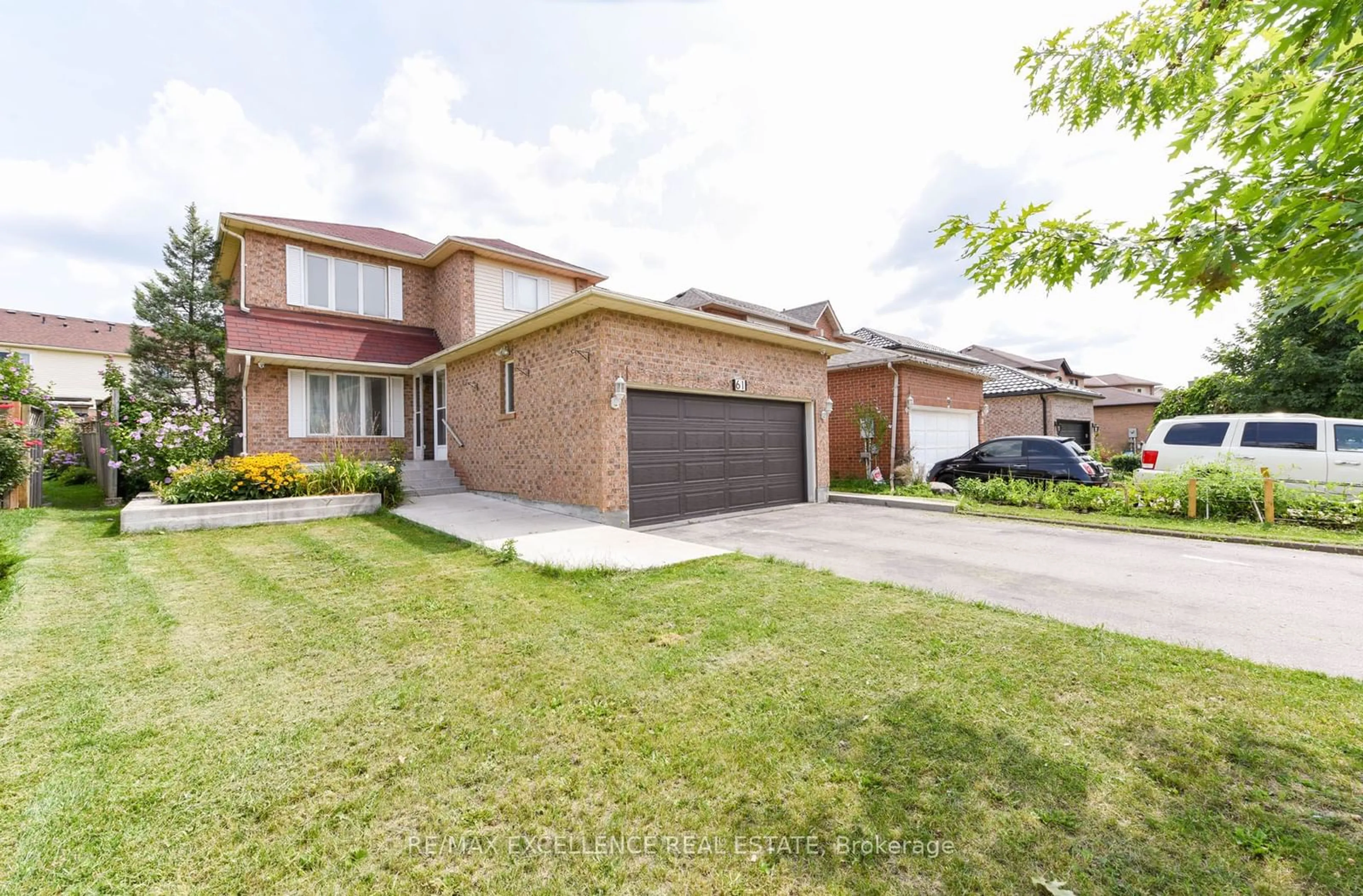 Home with brick exterior material, street for 61 Drinkwater Rd, Brampton Ontario L6Y 4T8