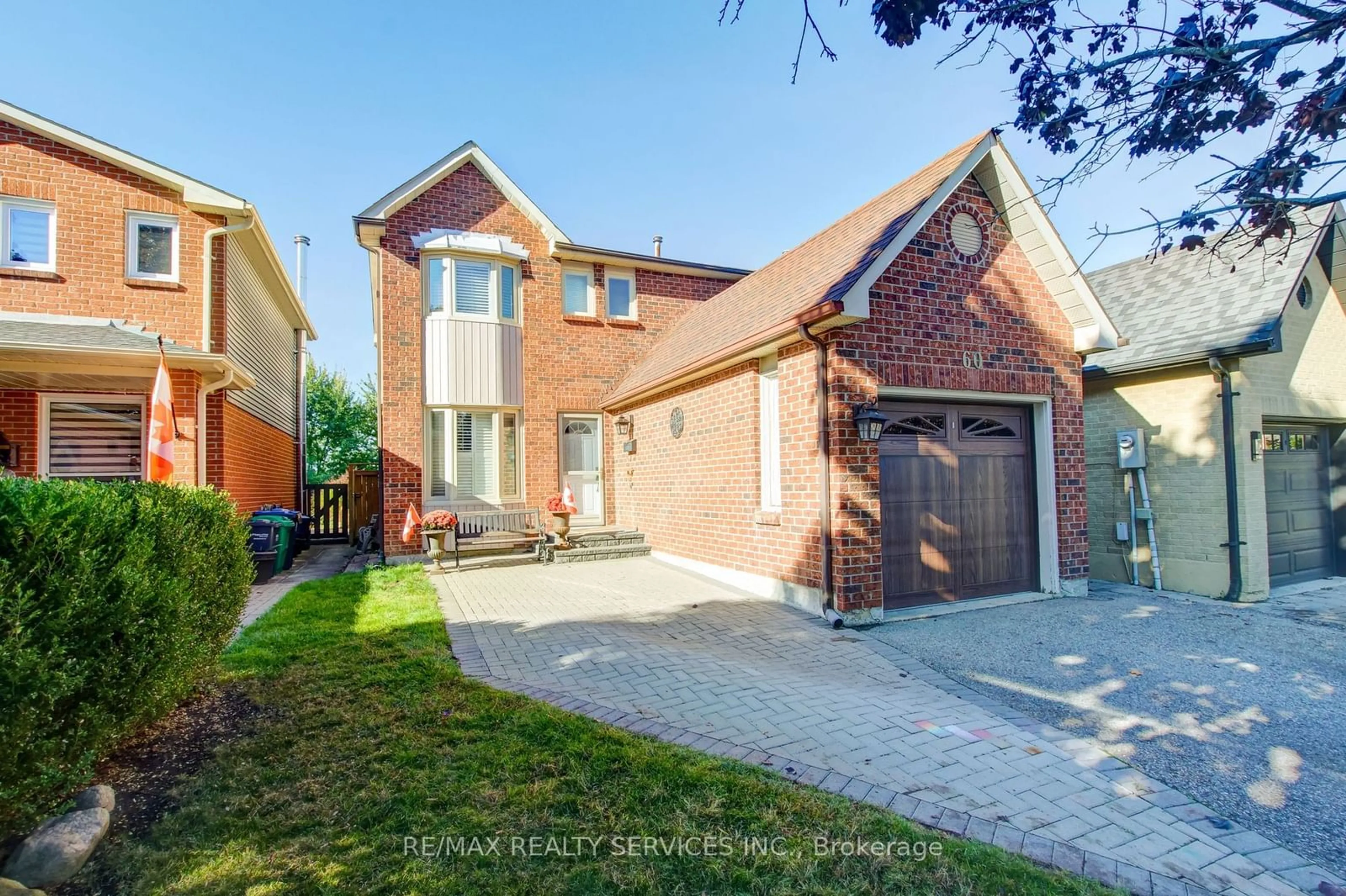 Home with brick exterior material, street for 60 Rawling Cres, Brampton Ontario L6Z 1N8