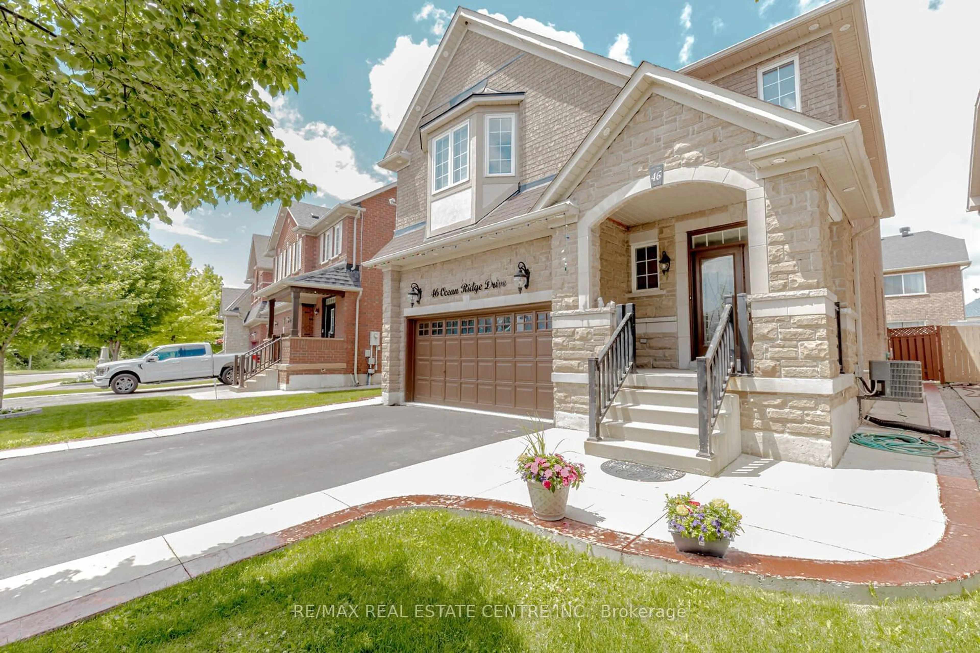 Home with brick exterior material, street for 46 Ocean Ridge Dr, Brampton Ontario L6R 3K5