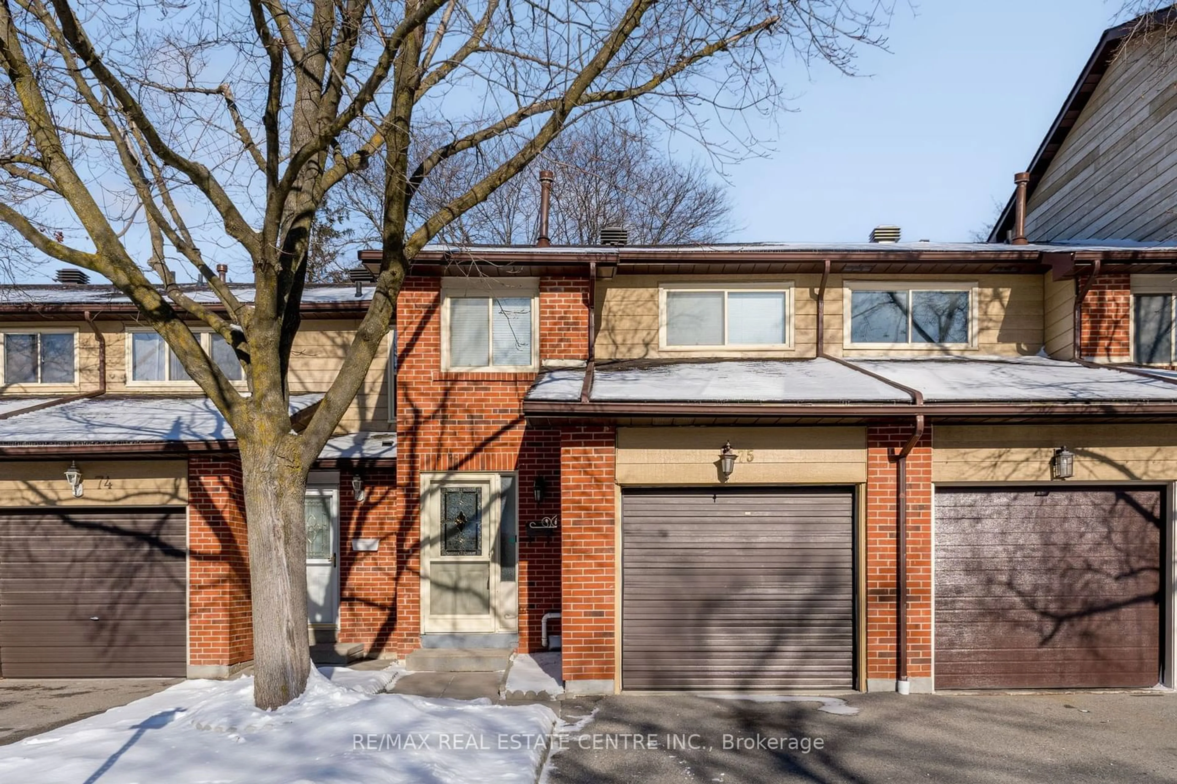 Home with brick exterior material, street for 75 Foster Cres, Brampton Ontario L6V 3M8